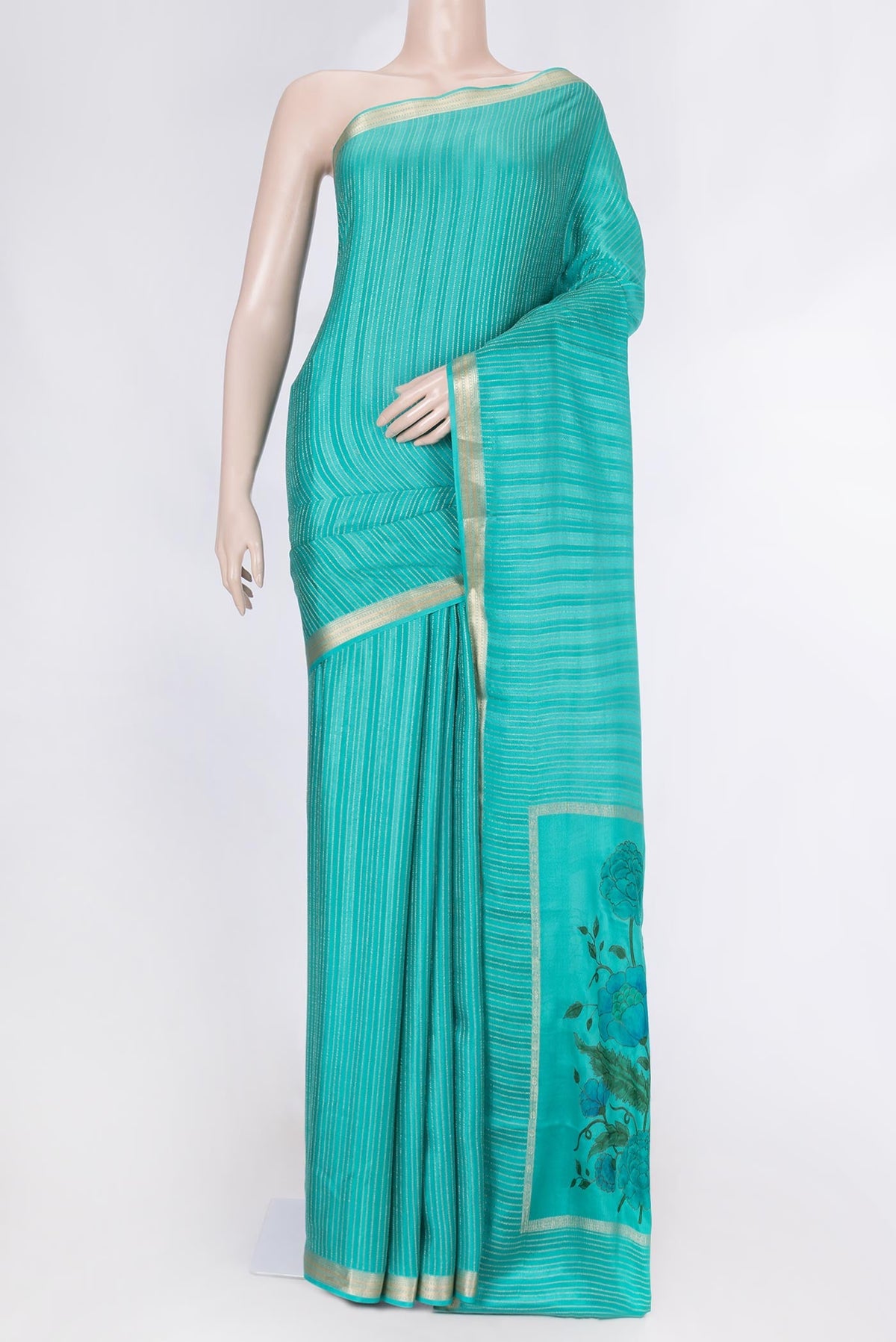 Sky Blue Mysore Crepe Saree with Stripes on the body and Zari Border displayed on a mannequin