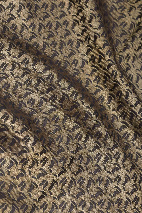 Close up of Black Mysore Crepe Saree with Zari Brocade on the body and Zari Border displaying folds