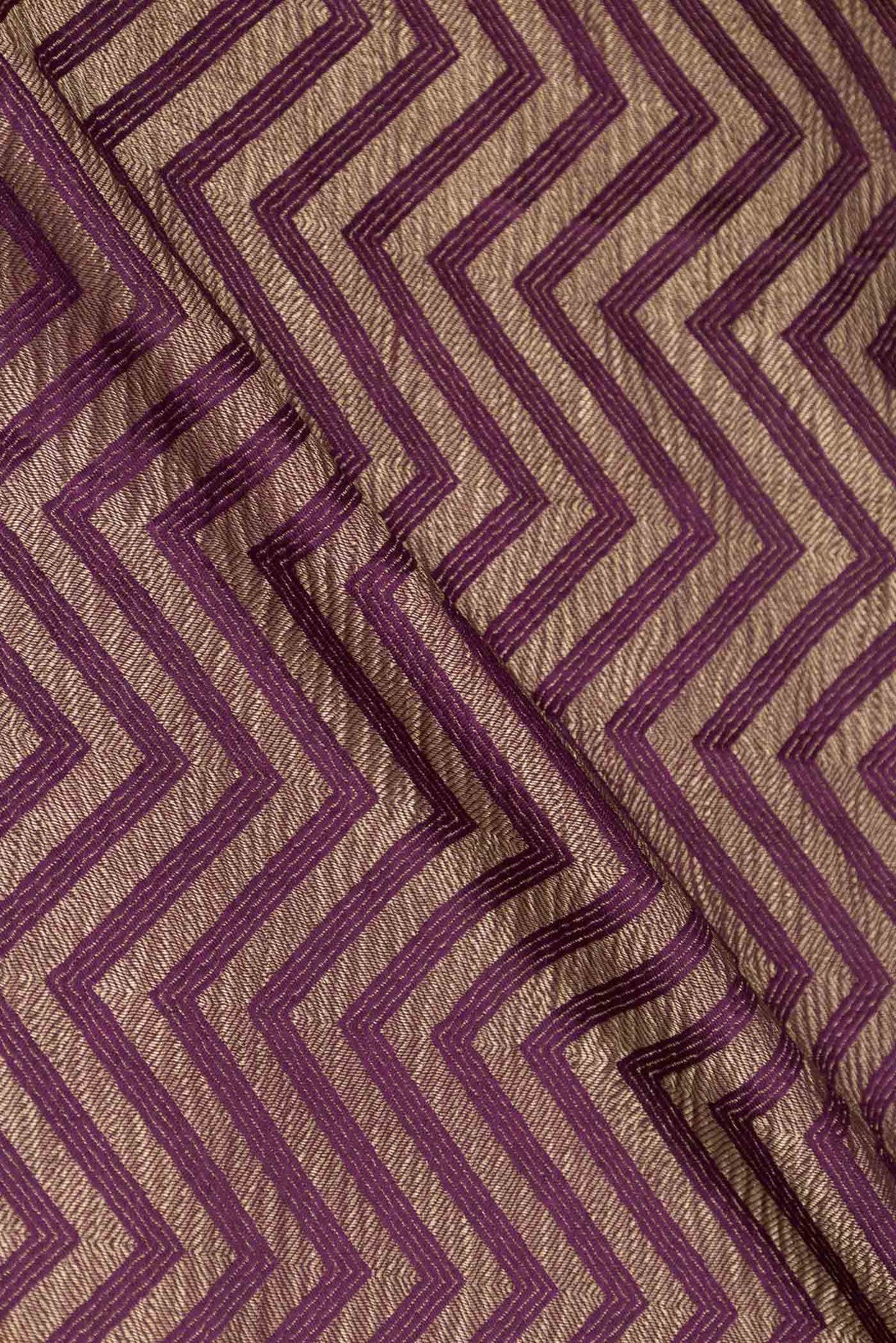 Close up of Purple Mysore Crepe Saree with Zari Brocade on the body and Zari Border displaying folds
