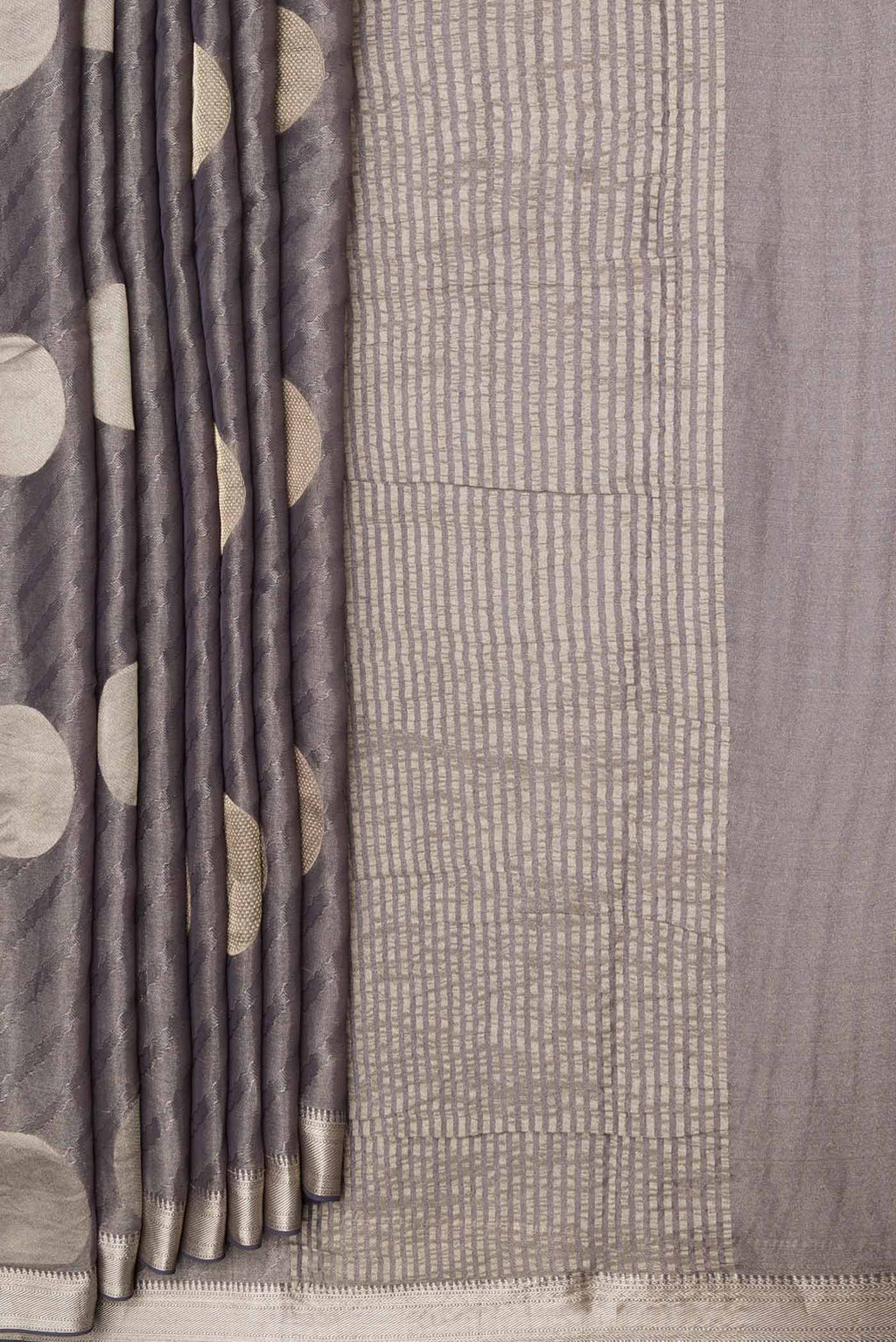 Pleats and pallu of Grey Dual Tone Mysore Georgette Saree with Zari Brocade on the body and Zari Border