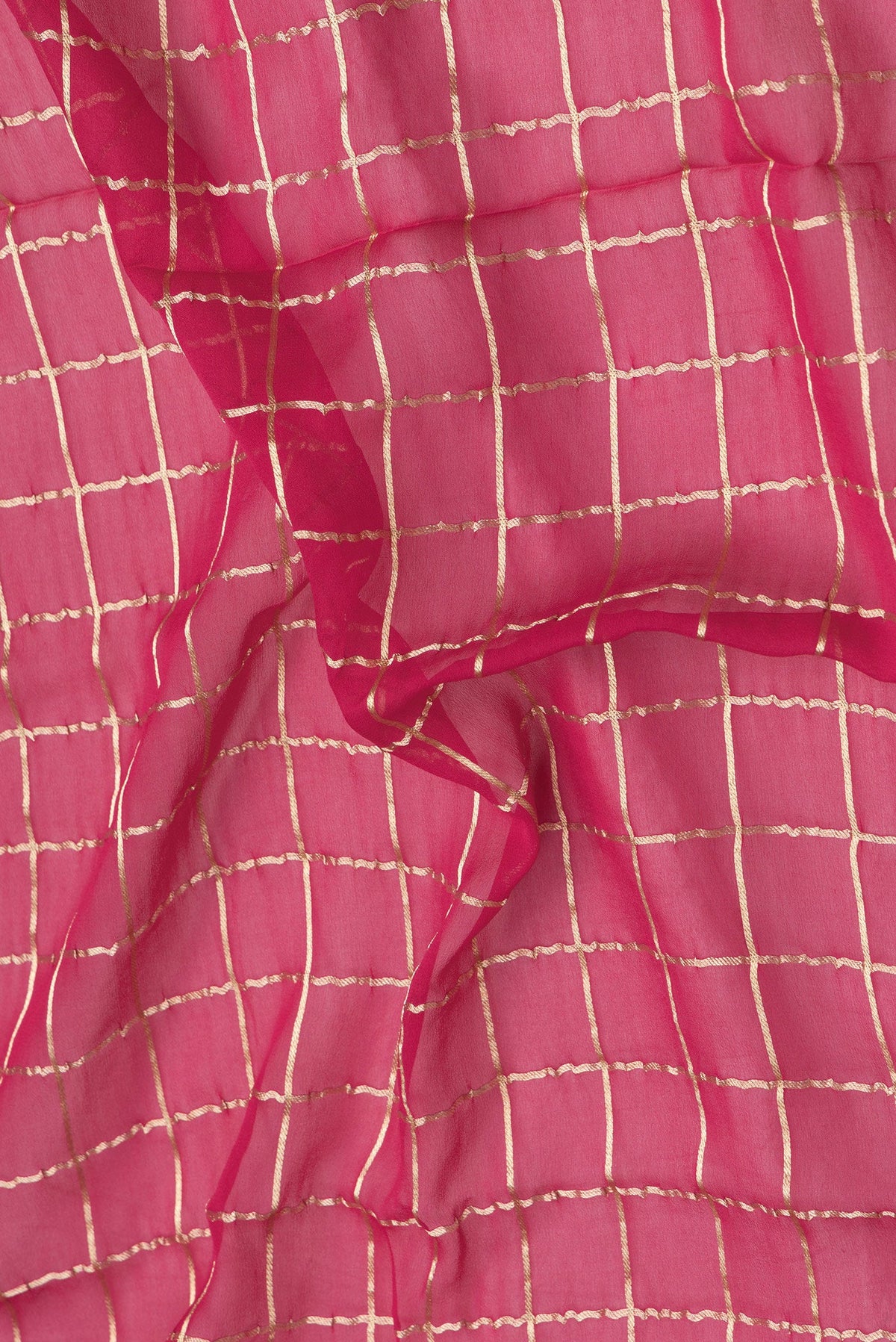 Close up of Pink Dual Tone Mysore Georgette Saree with Checked design on the body and Zari Border.  displaying folds