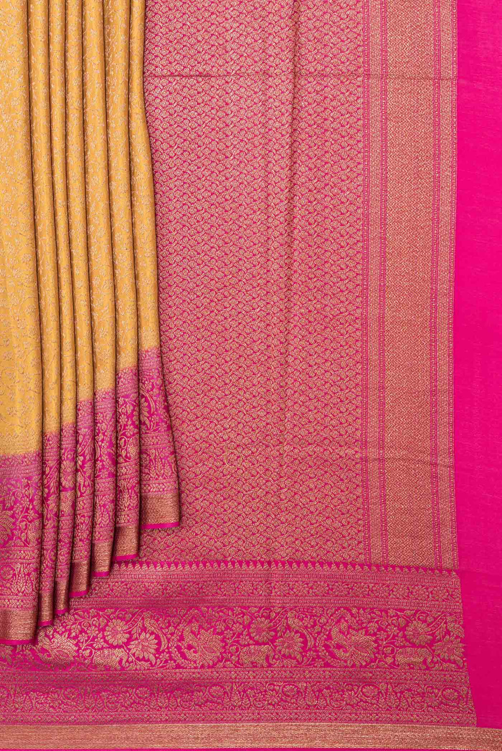 Pleats and pallu of Mustard Dual Tone Banarasi Silk Saree with Zari Brocade on the body and Zari Border. 