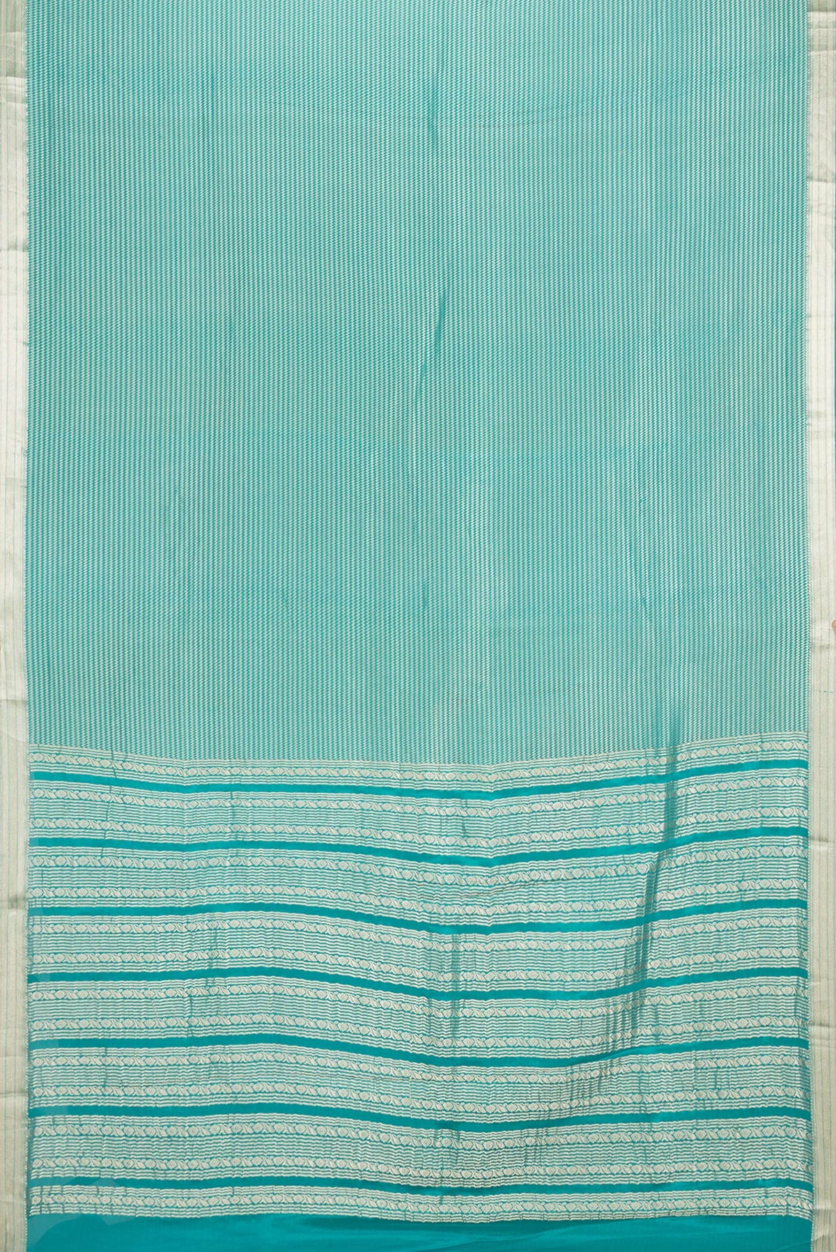 Flat view of Sky Blue Dual Tone Banarasi Georgette Saree with Zari Brocade on the body and Zari Border. 