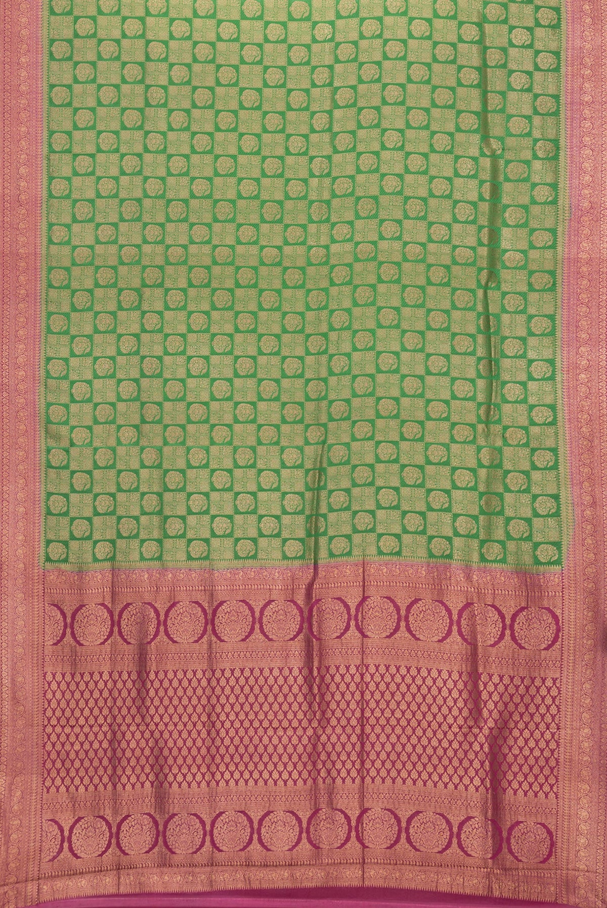 Flat view of Bottle Green Dual Tone Banarasi Georgette Saree with Zari Brocade on the body and Zari Border. 