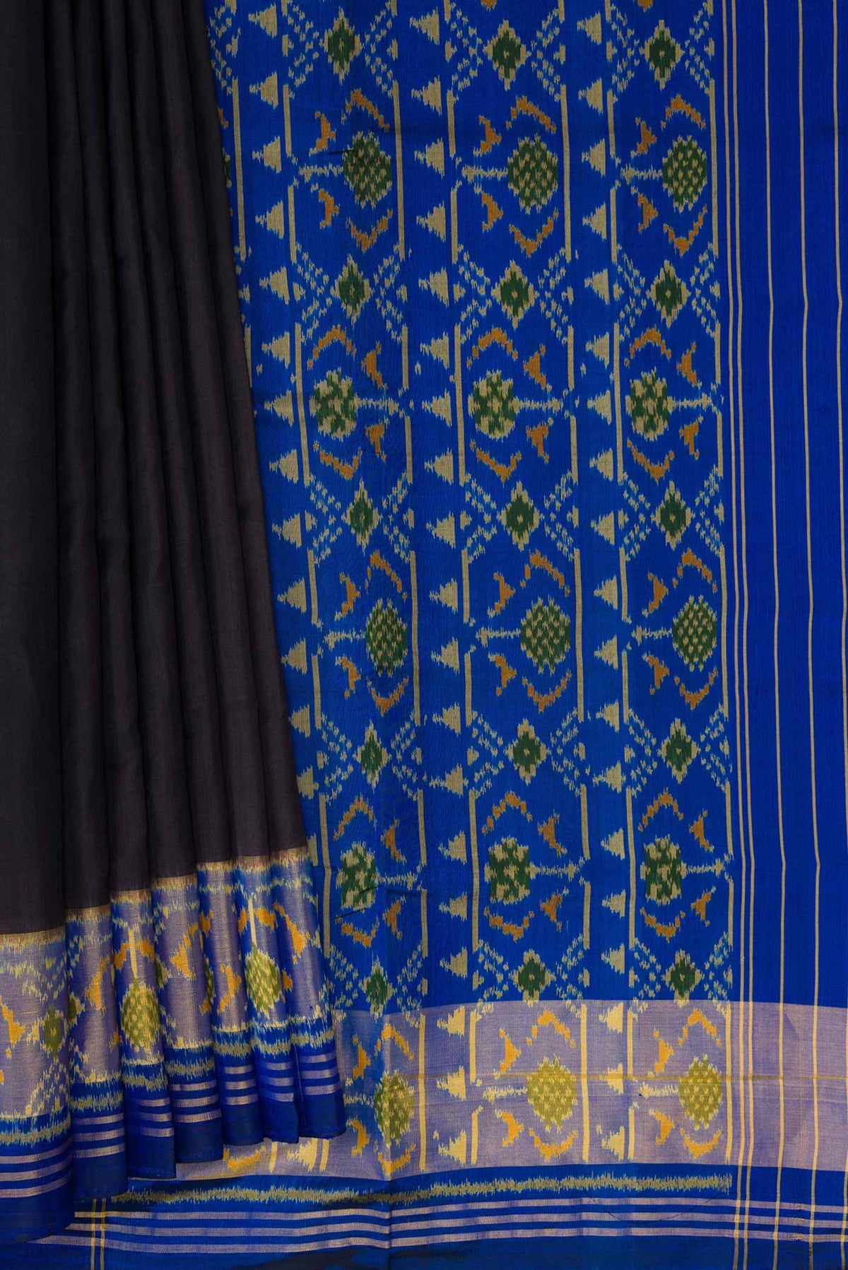 Pleats and pallu of Black Dual Tone Rajkot Patola Silk Saree with Plain Body and Ikat Border