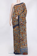 Mehandi Green Dual Tone Tussar Silk Saree with Printed design on the body and Plain Border.  displayed on a mannequin
