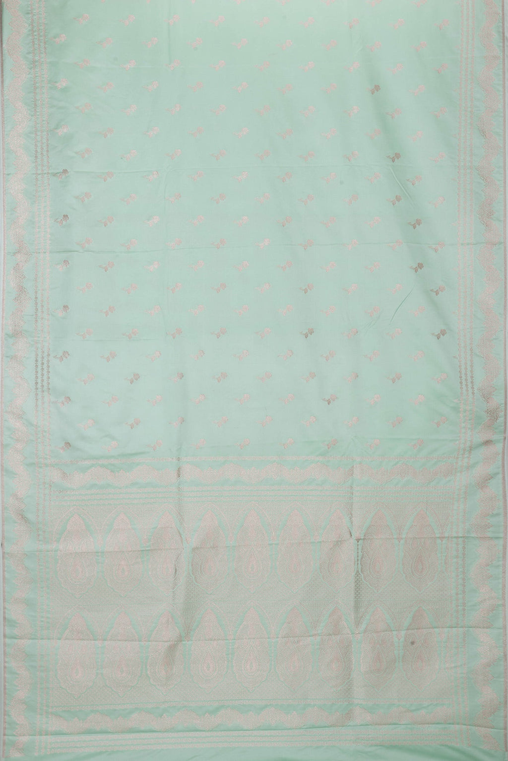 Flat view of Sea Green Dual Tone Banarasi Silk Saree with Zari Butta on the body and Fancy Border. 
