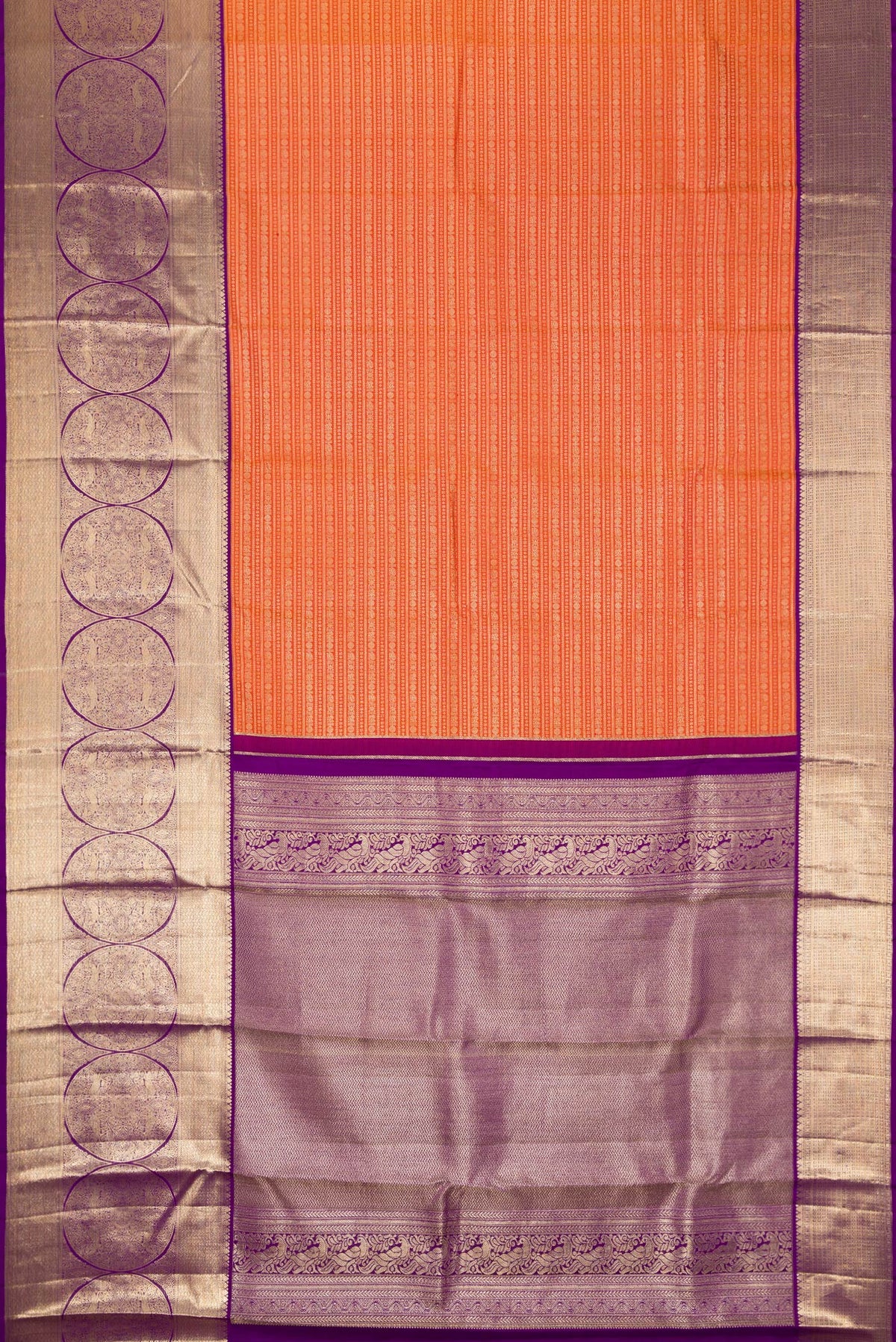 Flat view of Orange Kanjivaram Silk Saree with Zari Brocade on the body and Zari Border. 