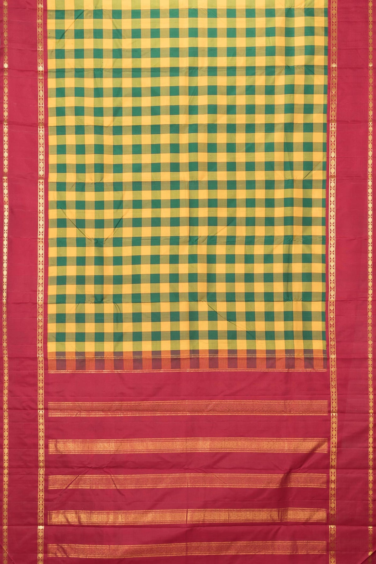 Flat view of Yellow and Green Color Kanchipuram Saree with Checked design on the body and Zari Border