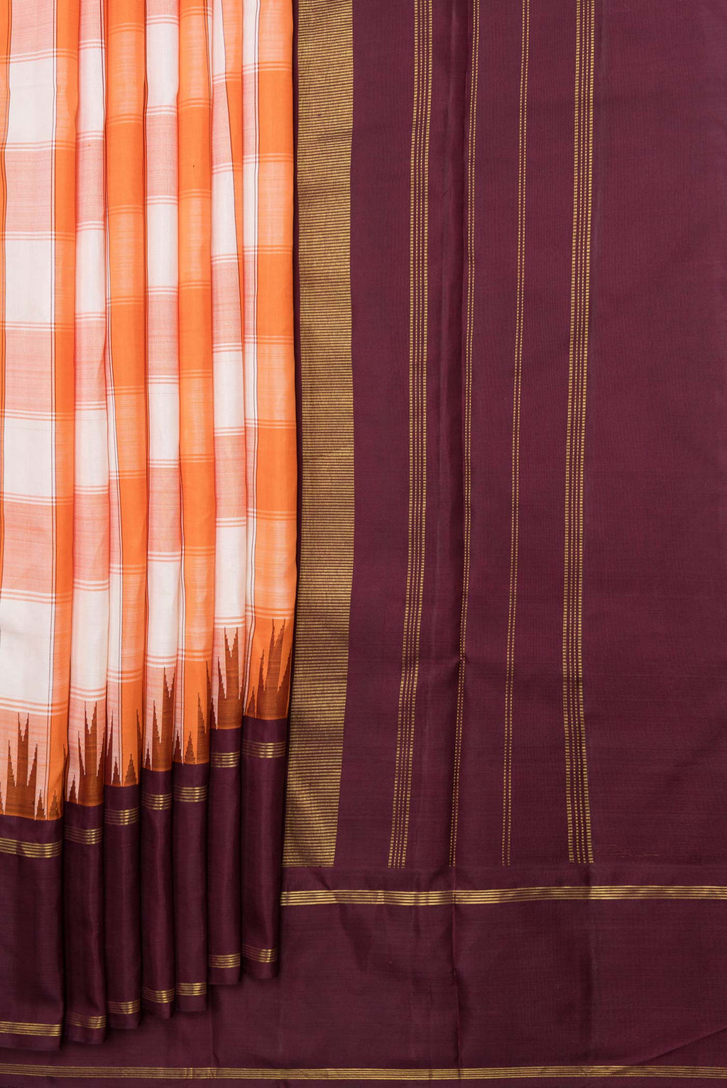 Pleats and pallu of Off white and Orange Color Kanchipuram Saree with Checked design on the body and Zari Border