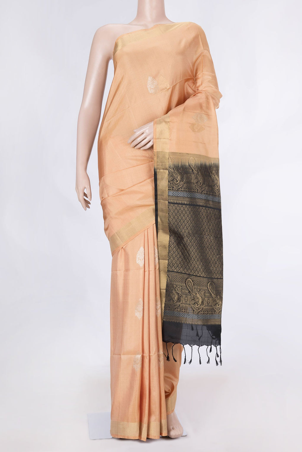 Beige Dual Tone Soft Silk Saree with Zari Butta on the body and Zari Border displayed on a mannequin