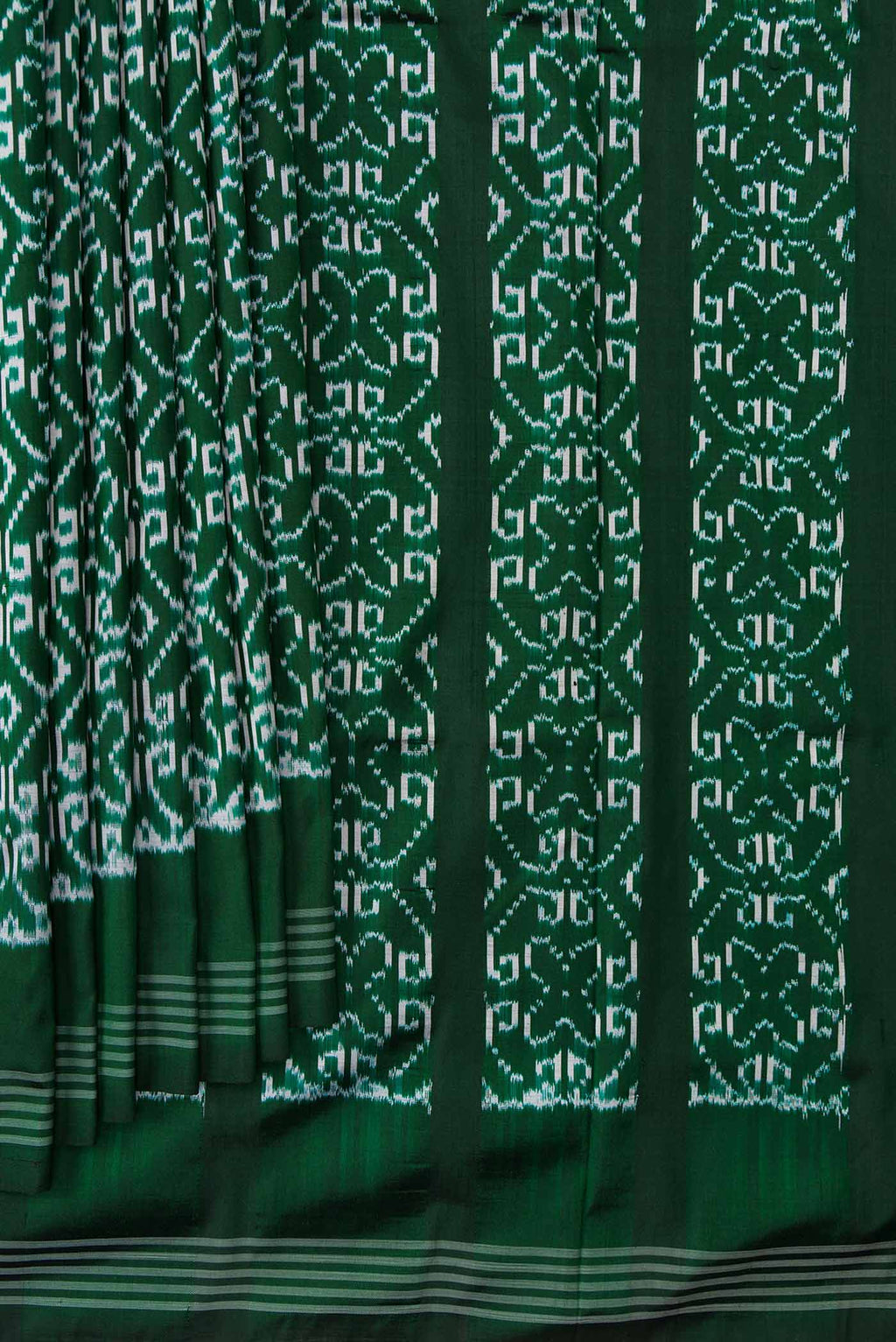 Pleats and pallu of Green Dual Tone Double Ikat Saree with Ikat Print on the body and Zari Border. 