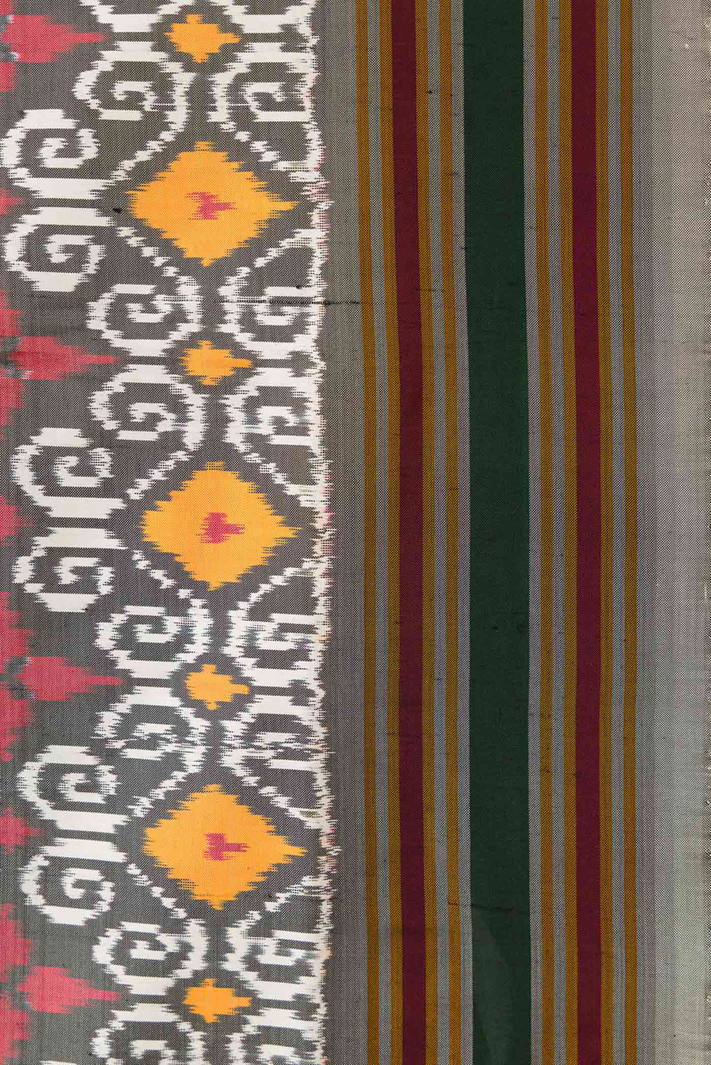 Border image of Grey Dual Tone Double Ikat Saree with Ikat Print on the body and Thread Border