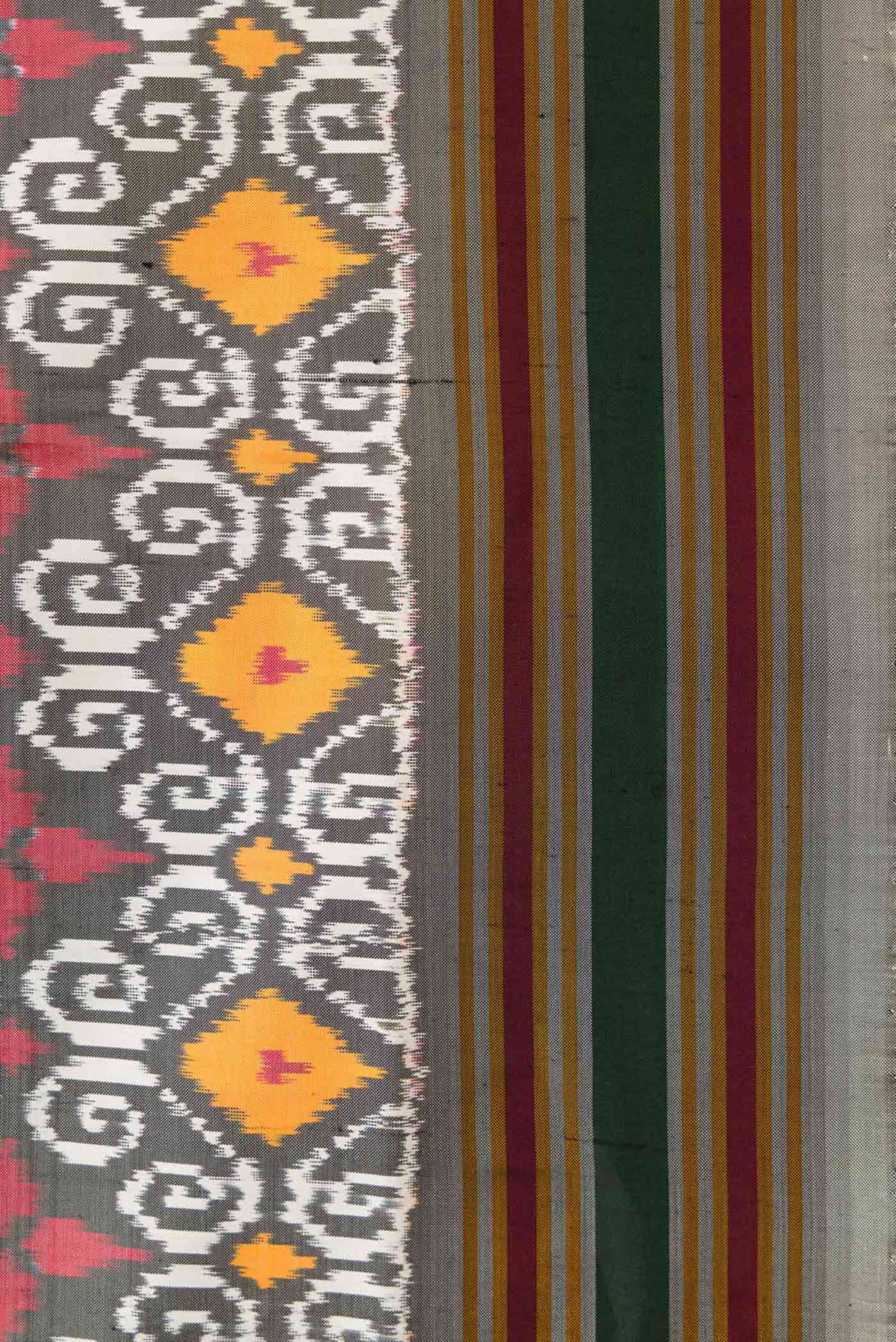 Border image of Grey Dual Tone Double Ikat Saree with Ikat Print on the body and Thread Border