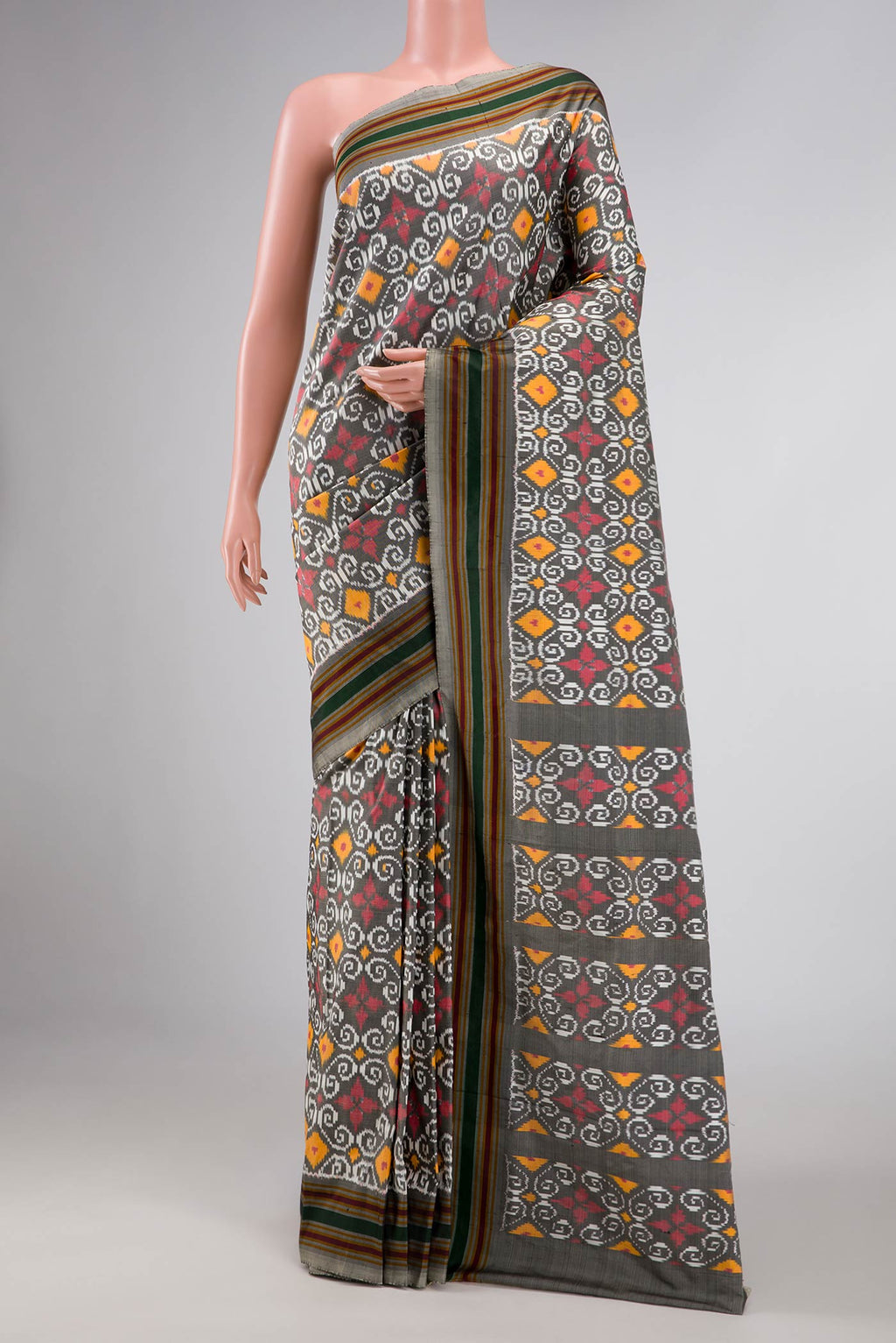 Grey Dual Tone Double Ikat Saree with Ikat Print on the body and Thread Border displayed on a mannequin