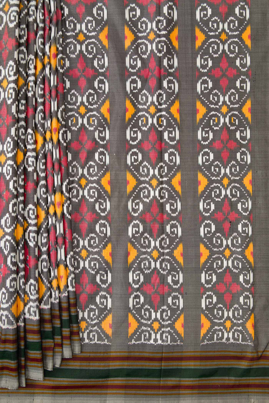 Pleats and pallu of Grey Dual Tone Double Ikat Saree with Ikat Print on the body and Thread Border