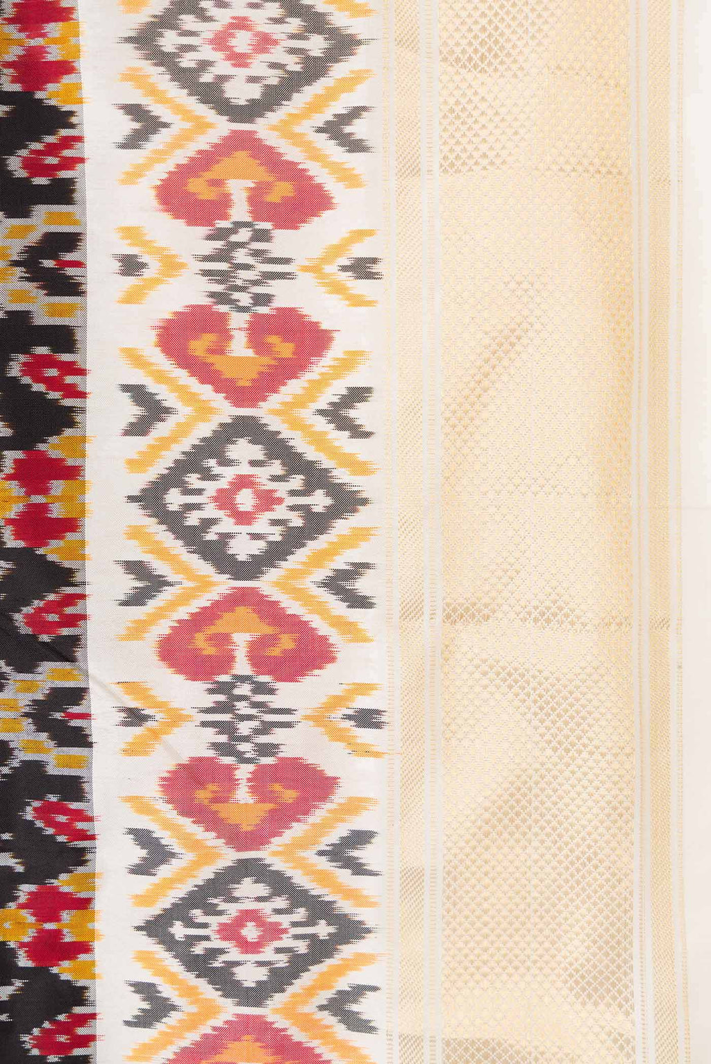 Border image of Black Dual Tone Double Ikat Saree with Ikat Print on the body and Ikat Border