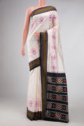 Off White Dual Tone Double Ikat Saree with Ikat Print on the body and Thread Border displayed on a mannequin