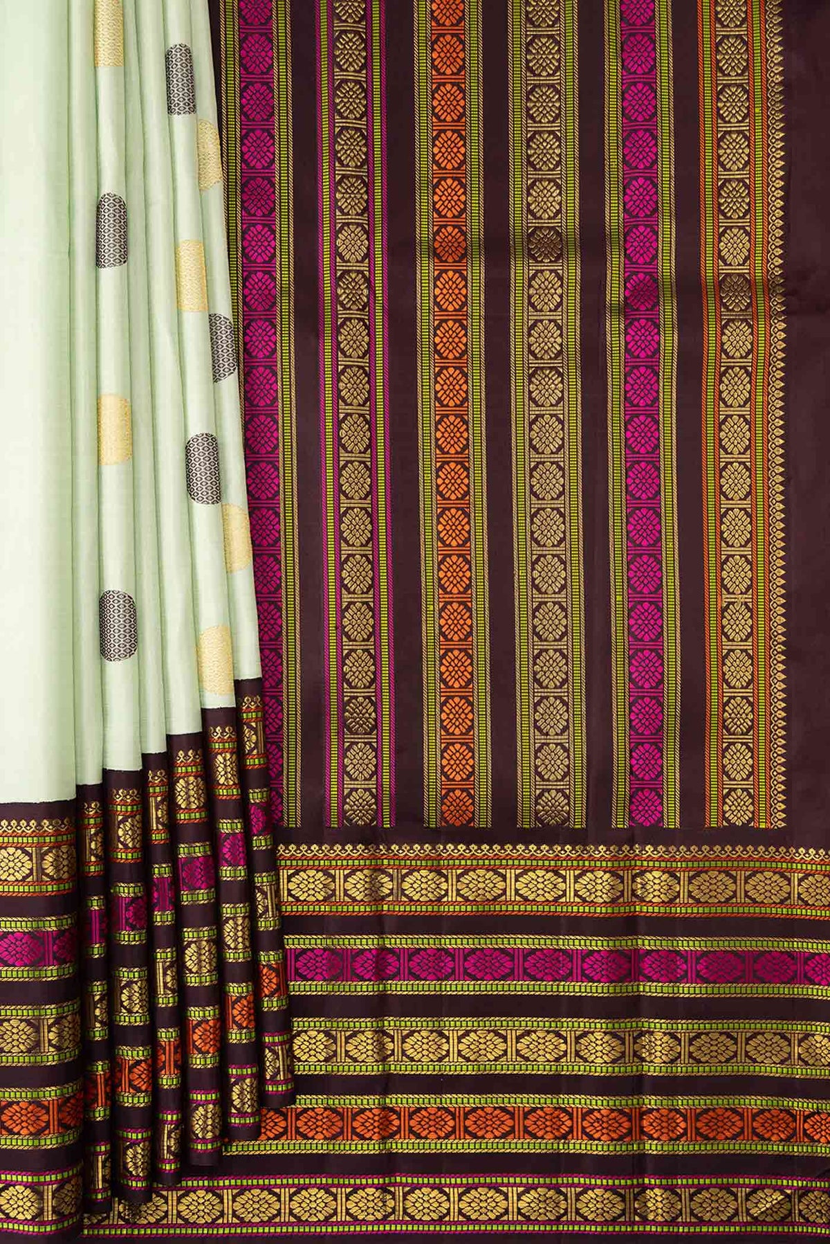 Pleats and pallu of Pure Silk Pure Zari Pista Green Dual Tone Kanchipuram Saree with Zari And Thread Butta on the body and Zari And Thread Border