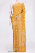 Mustard Dual Tone Banarasi Georgette Saree with Zari Butta on the body and Zari Border.  displayed on a mannequin