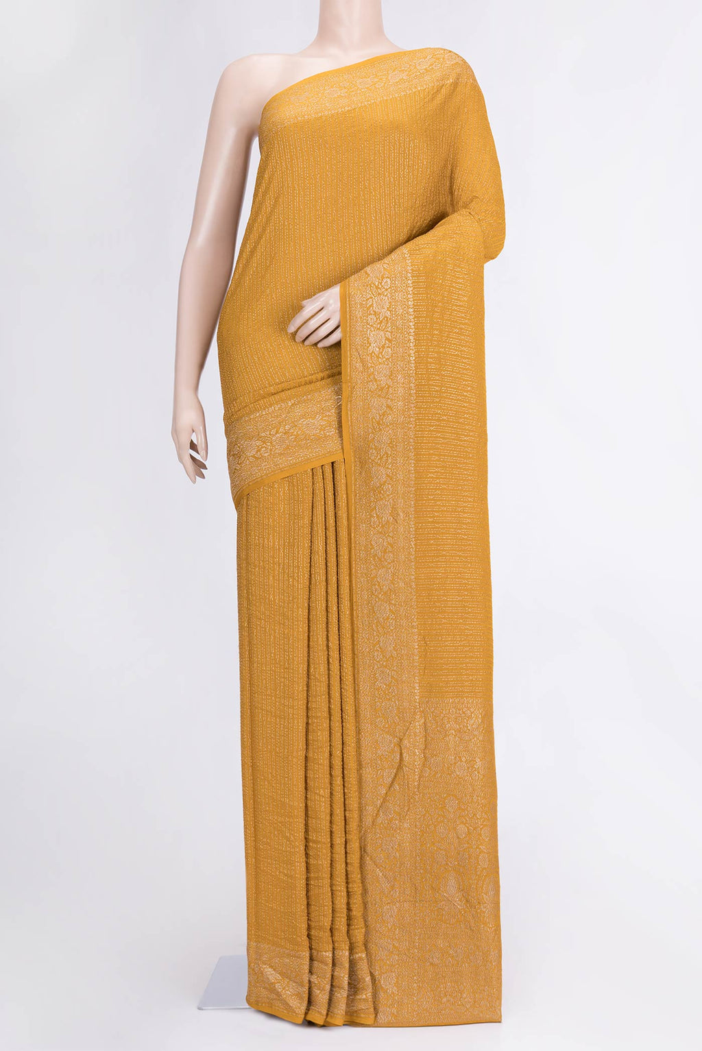 Mustard Dual Tone Banarasi Georgette Saree with Zari Brocade on the body and Zari Border.  displayed on a mannequin