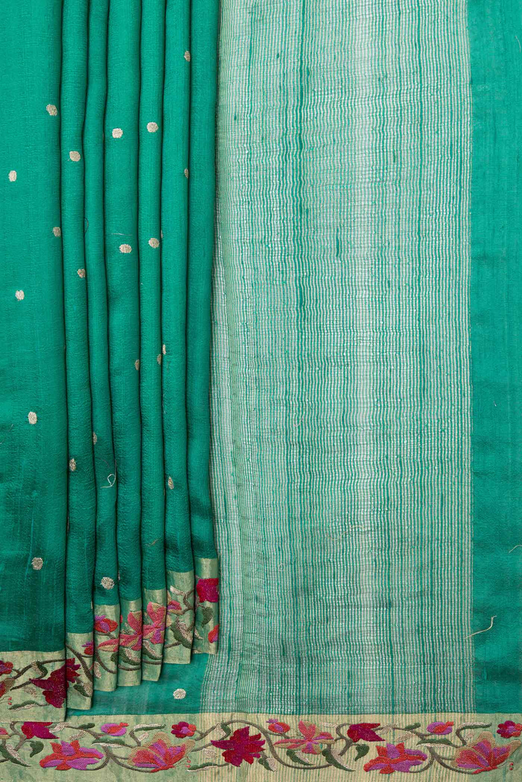 Pleats and pallu of Green Tussar Silk Saree with Embroidery on the body and Embroidery Border