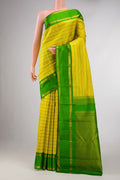 Yellow Dual Tone Kanchipuram Silk Saree with Stripes on the body and Zari Border displayed on a mannequin