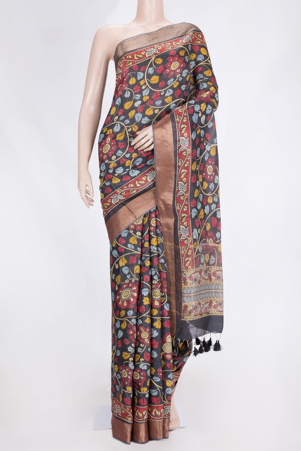 Black Dual Tone Tussar Saree with kalamkari Print on the body and Zari Border.  displayed on a mannequin