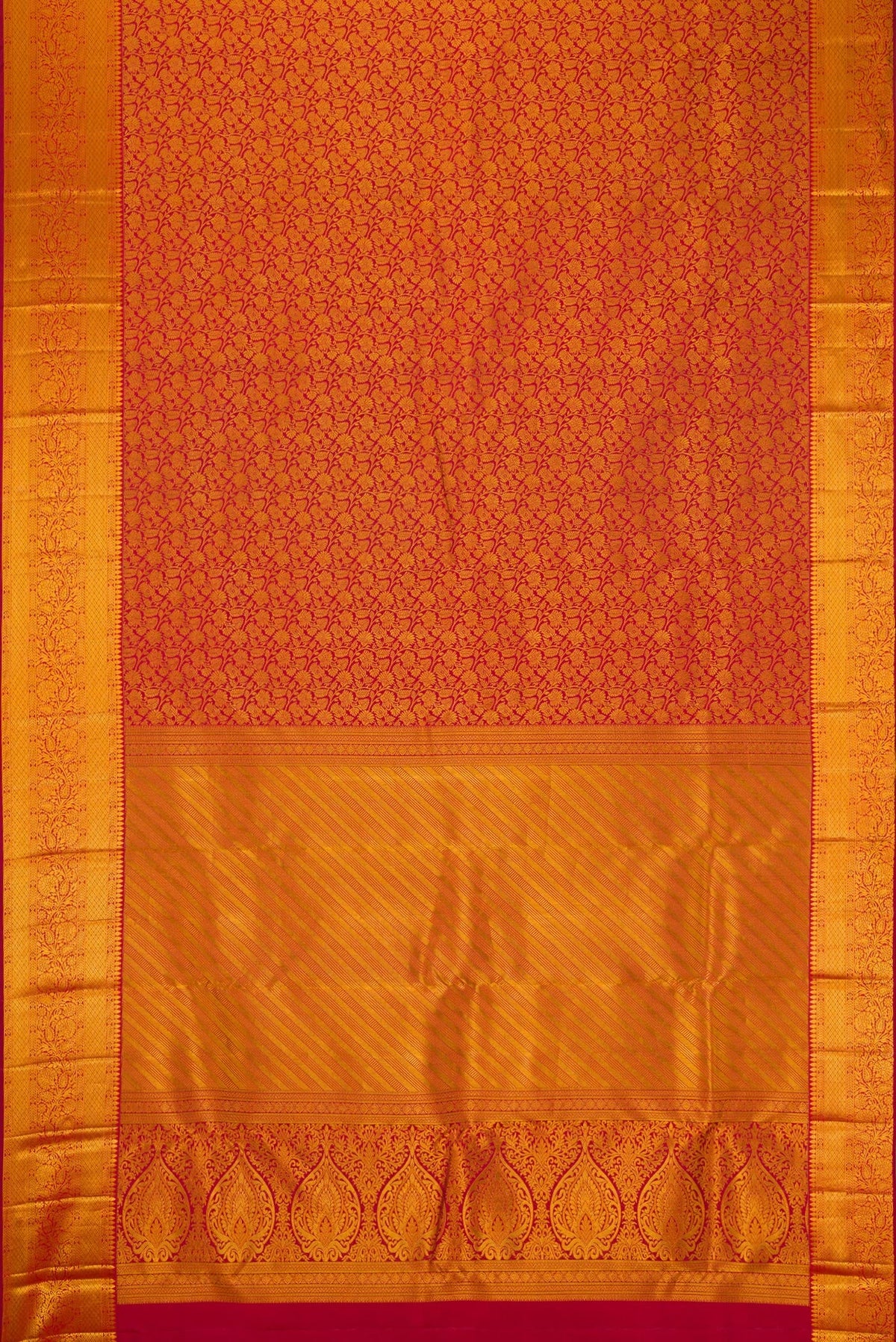 Flat view of Maroon Kanjivaram Silk Saree with Zari Brocade on the body and Zari Border. 