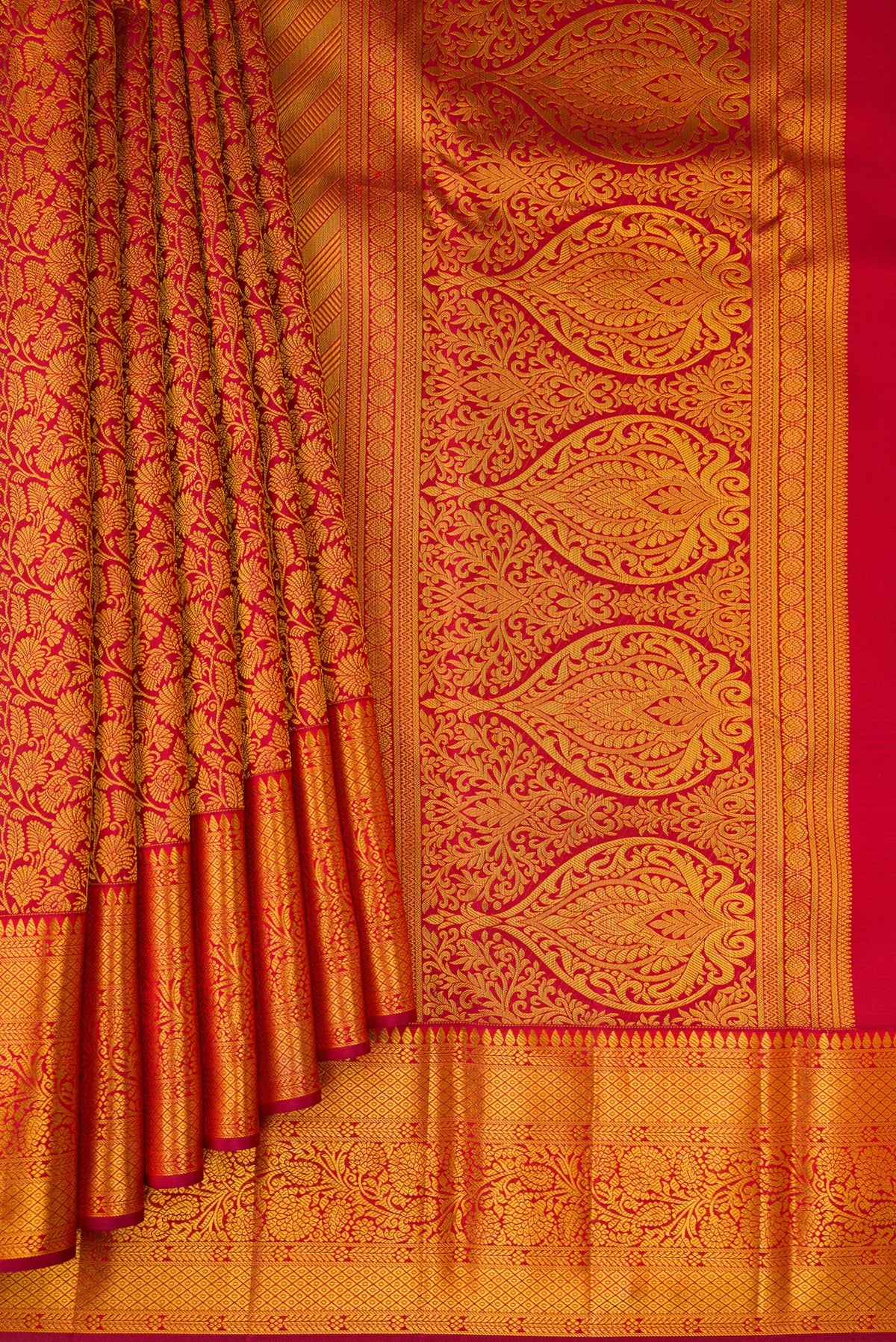 Pleats and pallu of Maroon Kanjivaram Silk Saree with Zari Brocade on the body and Zari Border. 