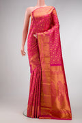 Pink Kanjivaram Silk Saree with Zari Brocade on the body and Zari Border.  displayed on a mannequin