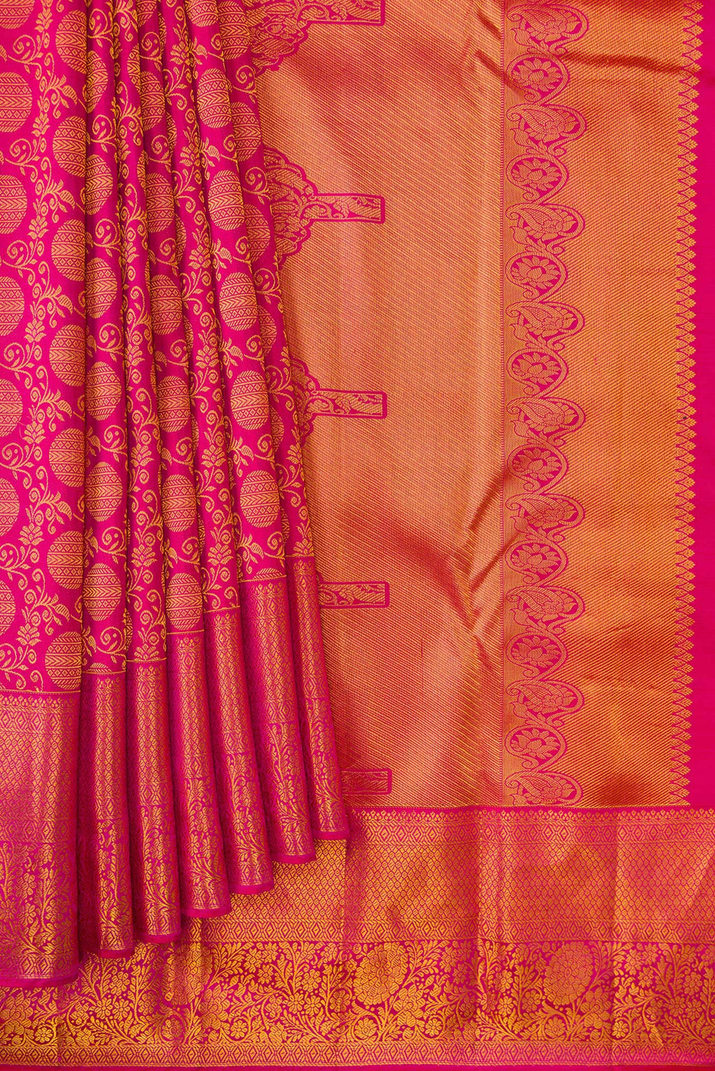 Pleats and pallu of Pink Kanjivaram Silk Saree with Zari Brocade on the body and Zari Border. 