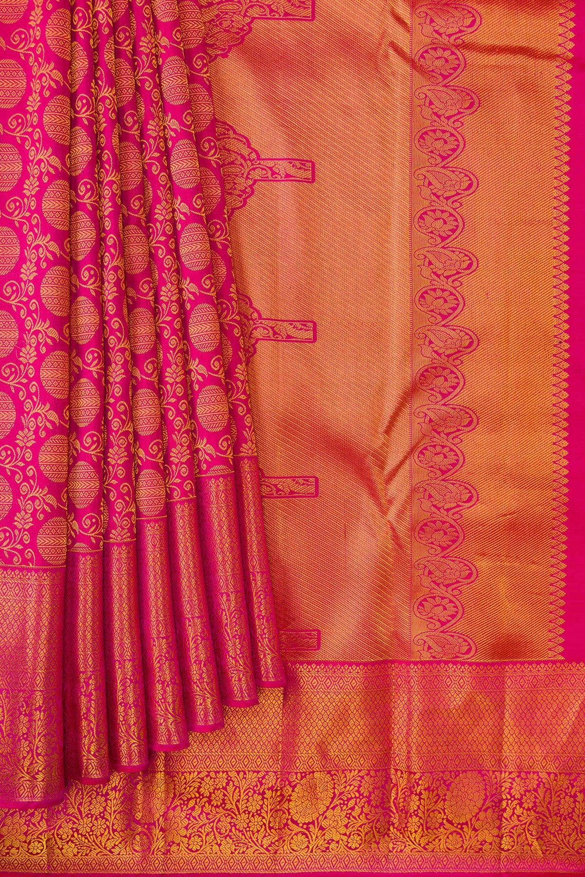Pleats and pallu of Pink Kanjivaram Silk Saree with Zari Brocade on the body and Zari Border. 