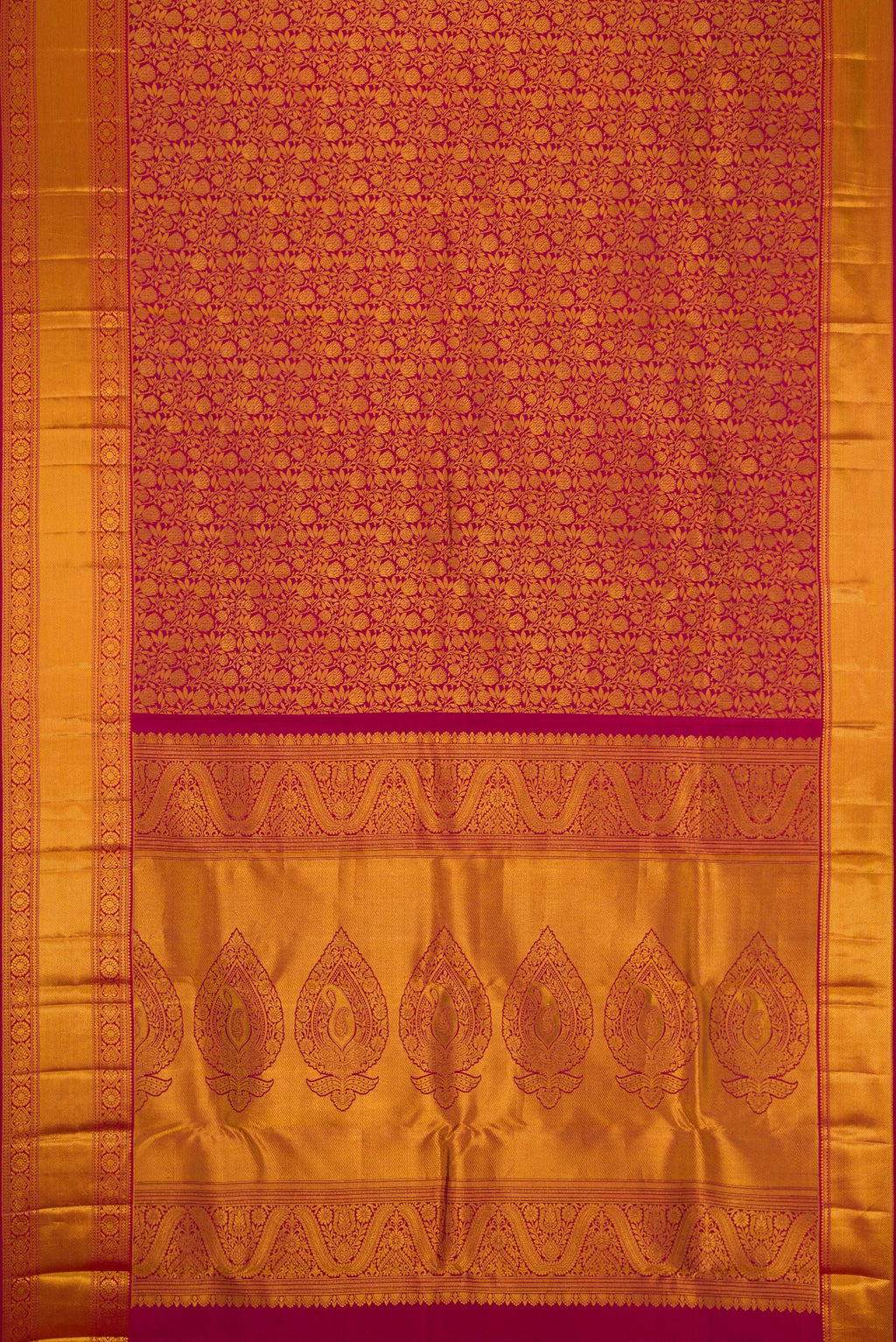 Flat view of Maroon Kanjivaram Silk Saree with Zari Brocade on the body and Zari Border. 