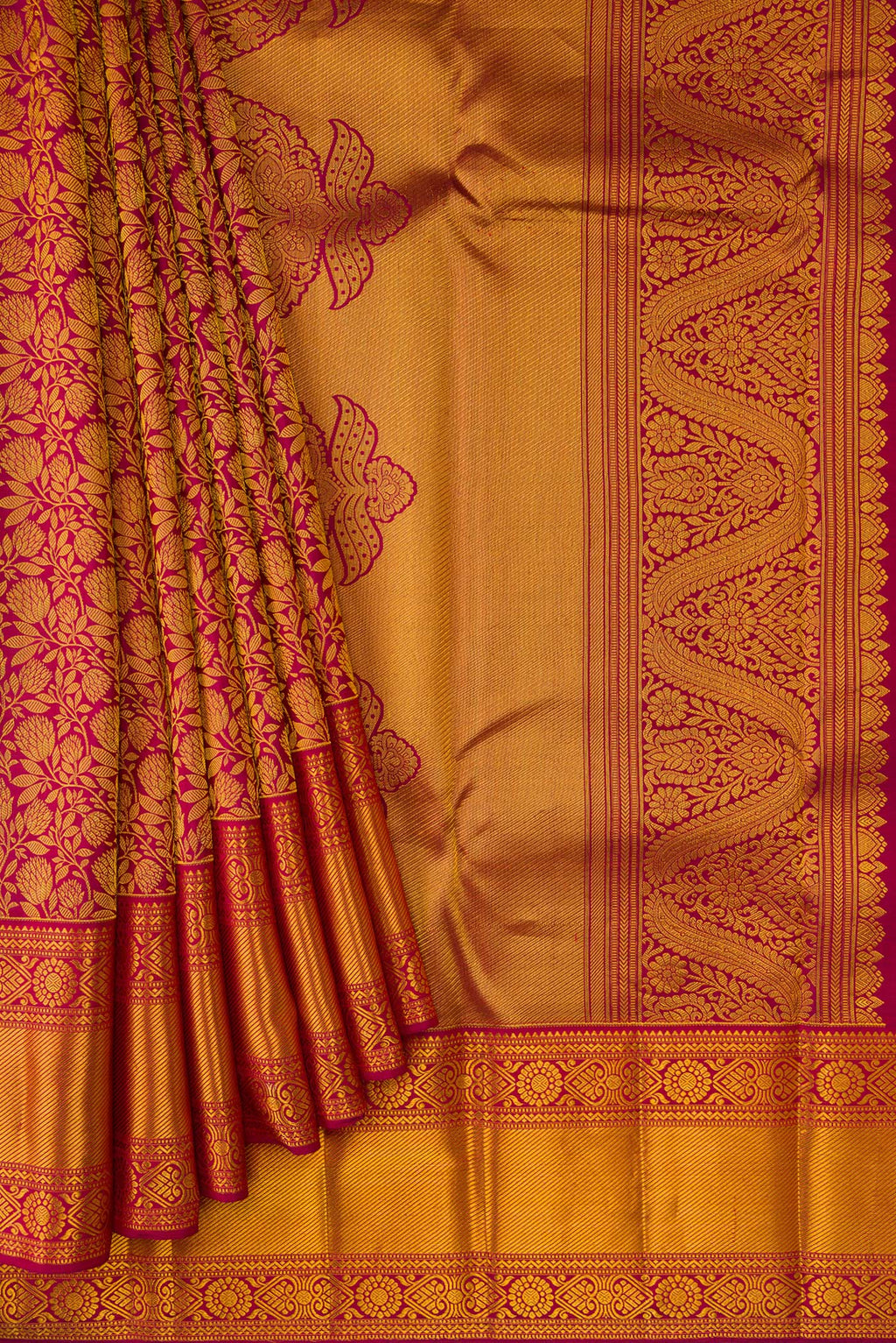 Pleats and pallu of Maroon Kanjivaram Silk Saree with Zari Brocade on the body and Zari Border. 