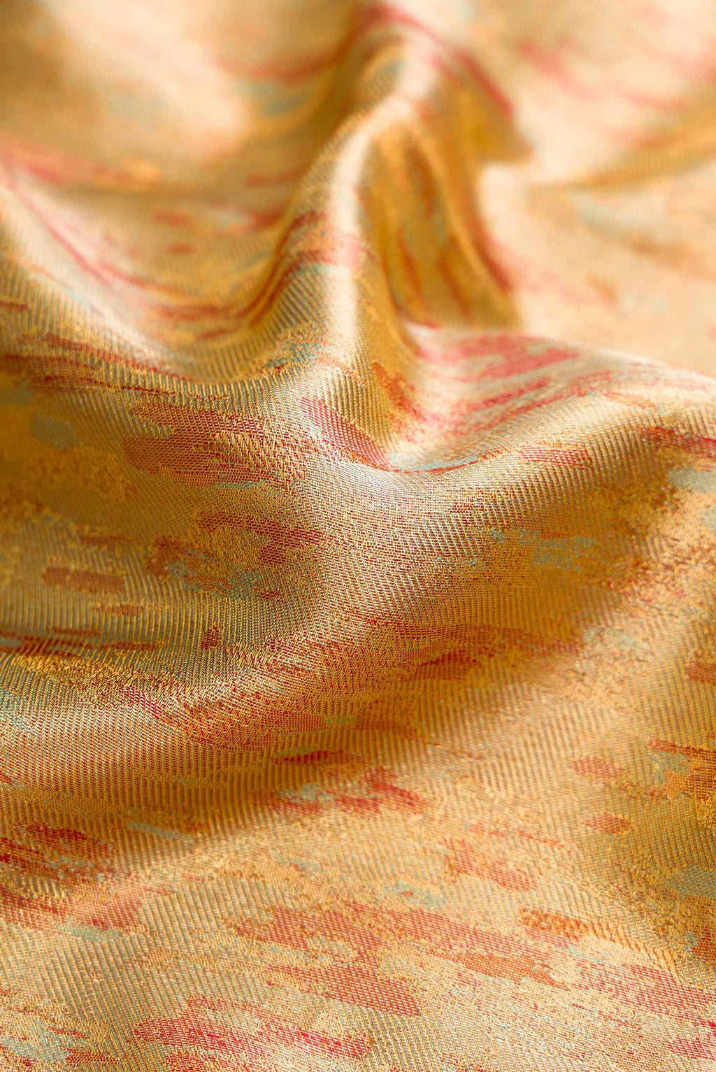 Close up of Sea Green Dual Tone Kanchipuram Silk Saree with Zari Brocade on the body and Fancy Border displaying folds