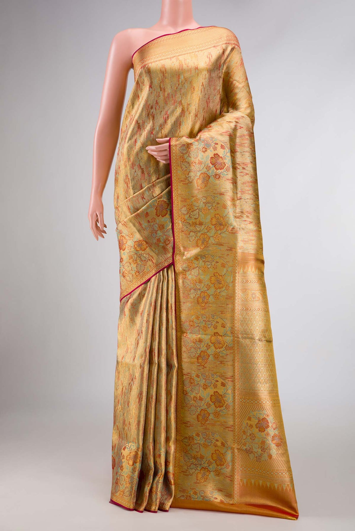 Sea Green Dual Tone Kanchipuram Silk Saree with Zari Brocade on the body and Fancy Border displayed on a mannequin