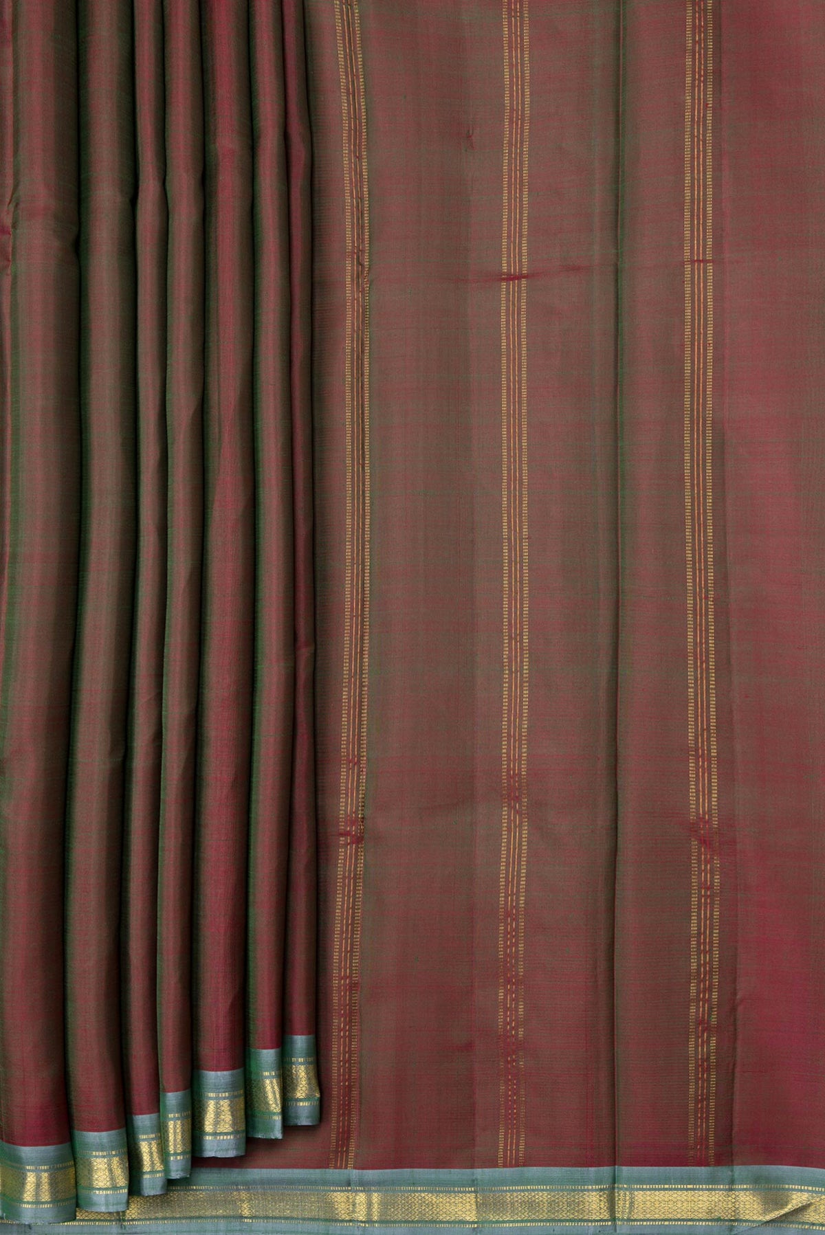 Pleats and pallu of Mehandi Green Dual Tone Kanchipuram Saree with Plain Body and Zari Border. 