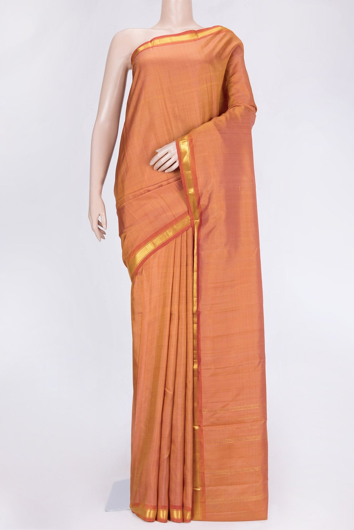 Golden Peach Dual Tone Kanchipuram Saree with Plain Body and Zari Border.  displayed on a mannequin