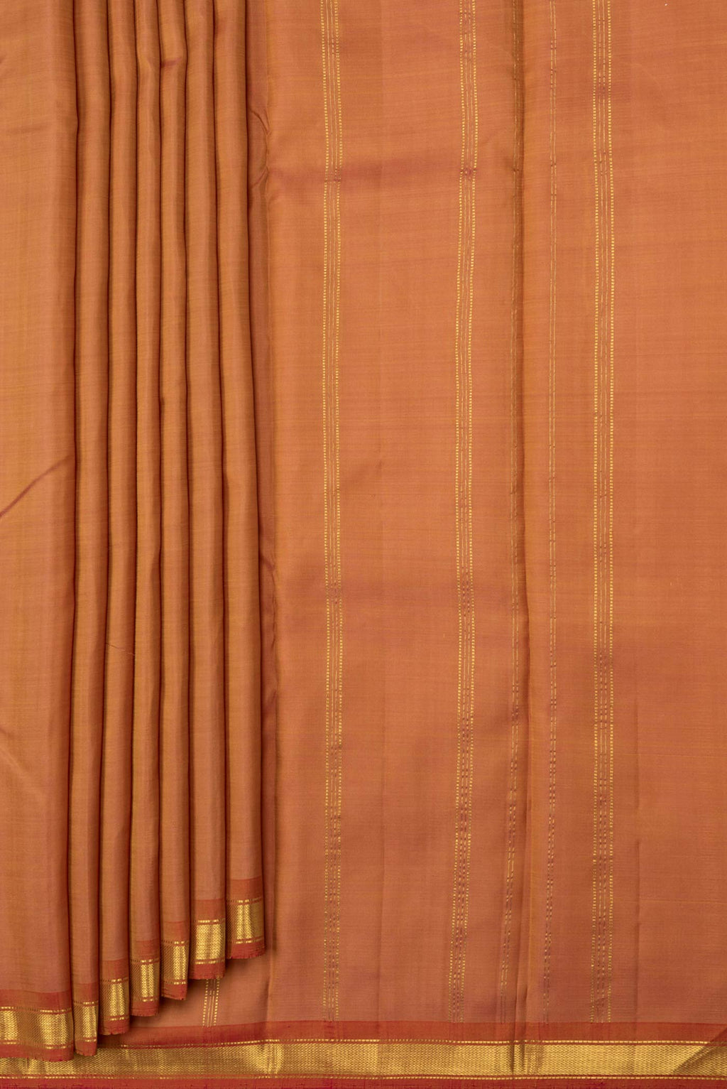 Pleats and pallu of Golden Peach Dual Tone Kanchipuram Saree with Plain Body and Zari Border. 
