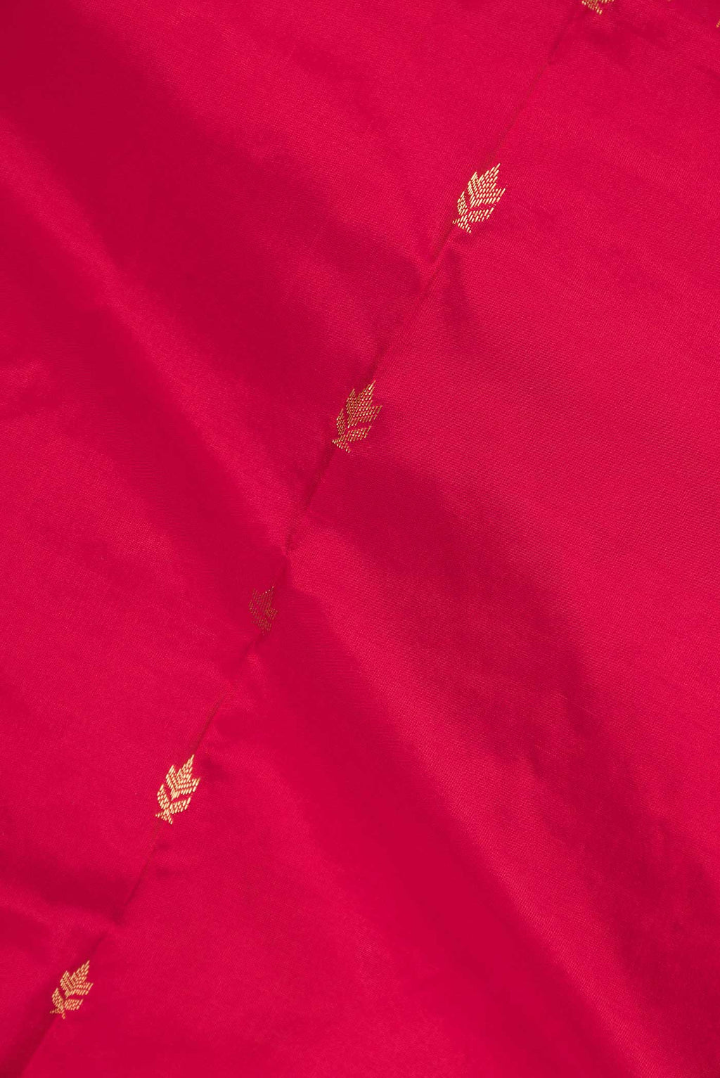 Close up of Pink Bangalore Silk Saree with Zari Butta on the body and Zari Border displaying folds