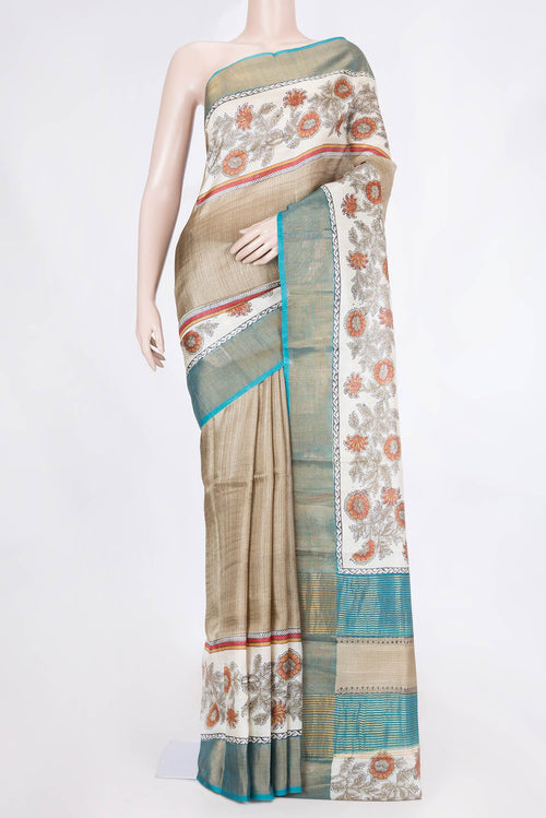Beige Dual Tone Tussar Saree with Stripes on the body and Fancy Border displayed on a mannequin