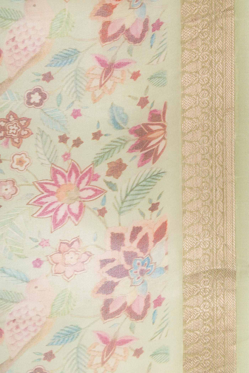 Border image of Pista Green Dual Tone Organza Silk Saree with Printed design on the body and Zari Border. 