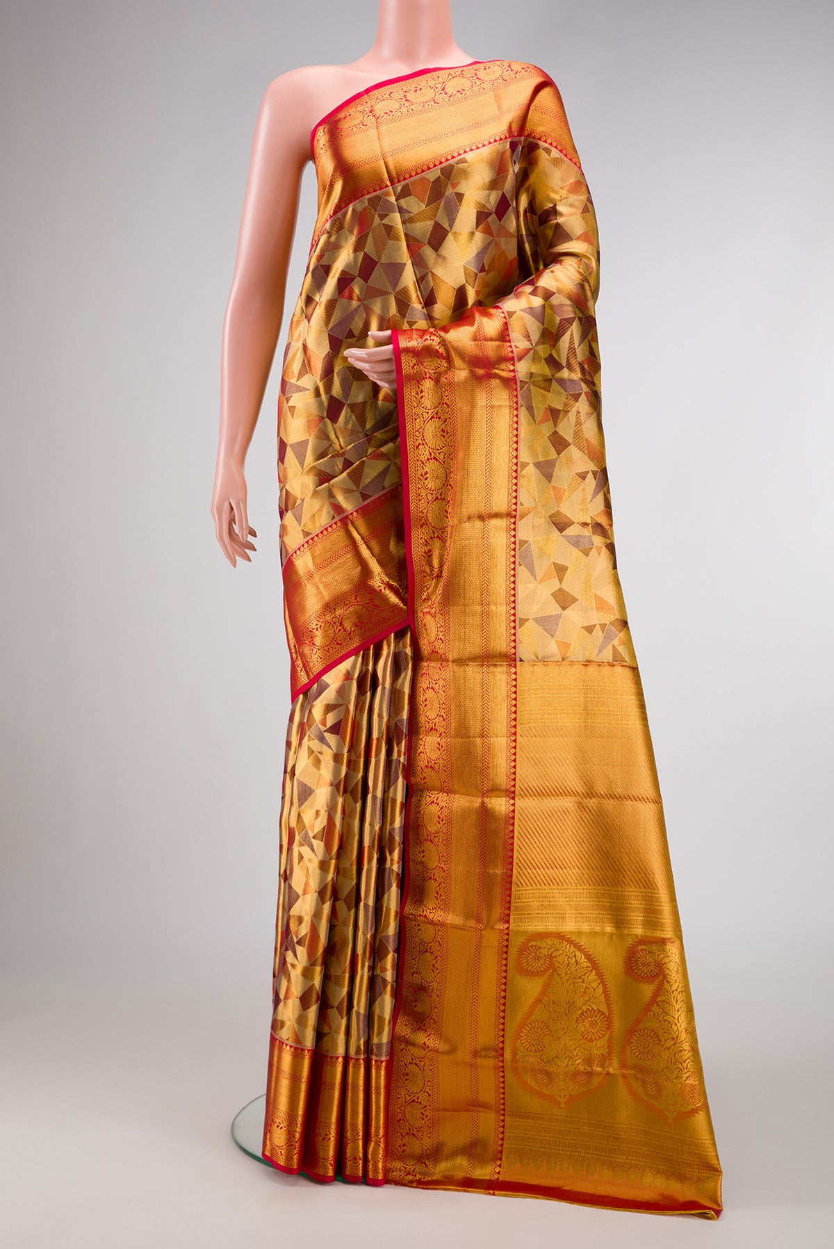 Gold Dual Tone Kanjivaram Tissue Silk Saree with Zari Brocade on the body and Zari Border.  displayed on a mannequin