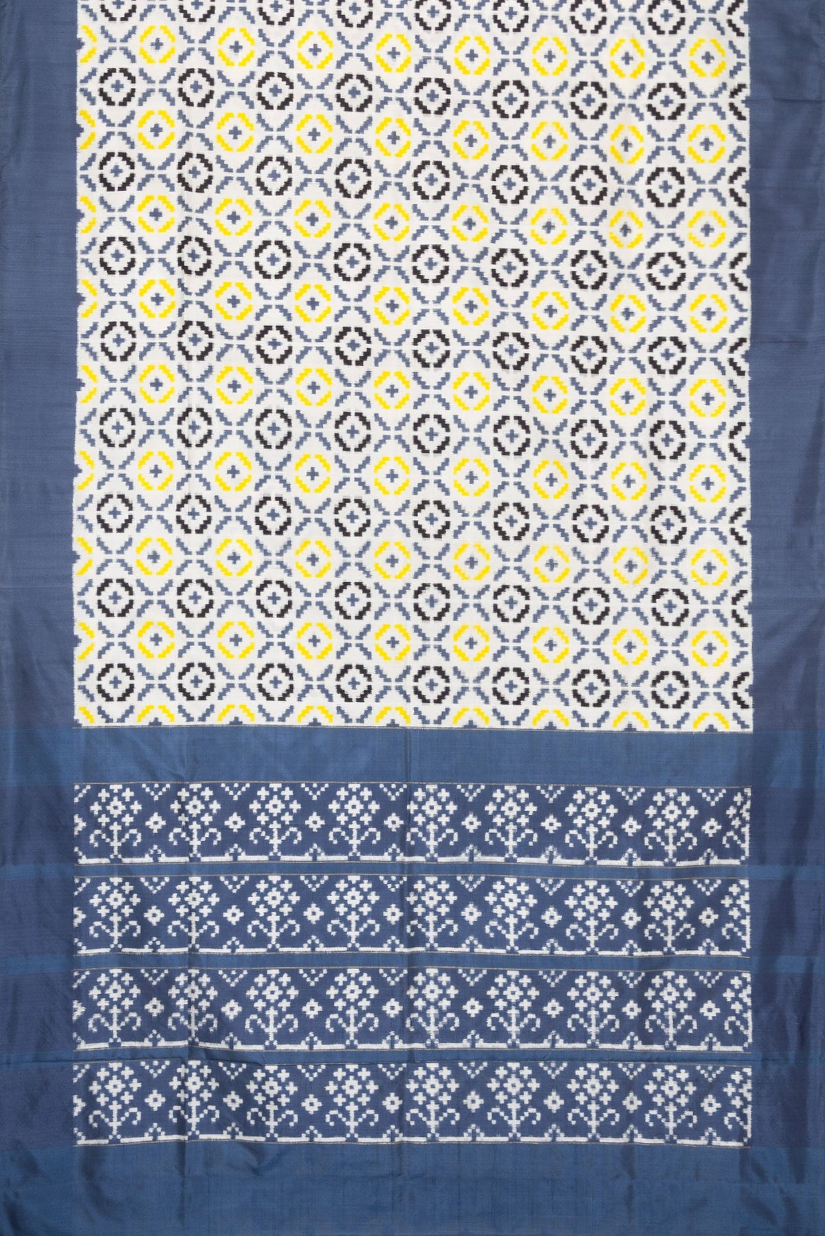 Flat view of Off White Dual Tone Double Ikat Saree with Ikat Print on the body and Plain Border. 