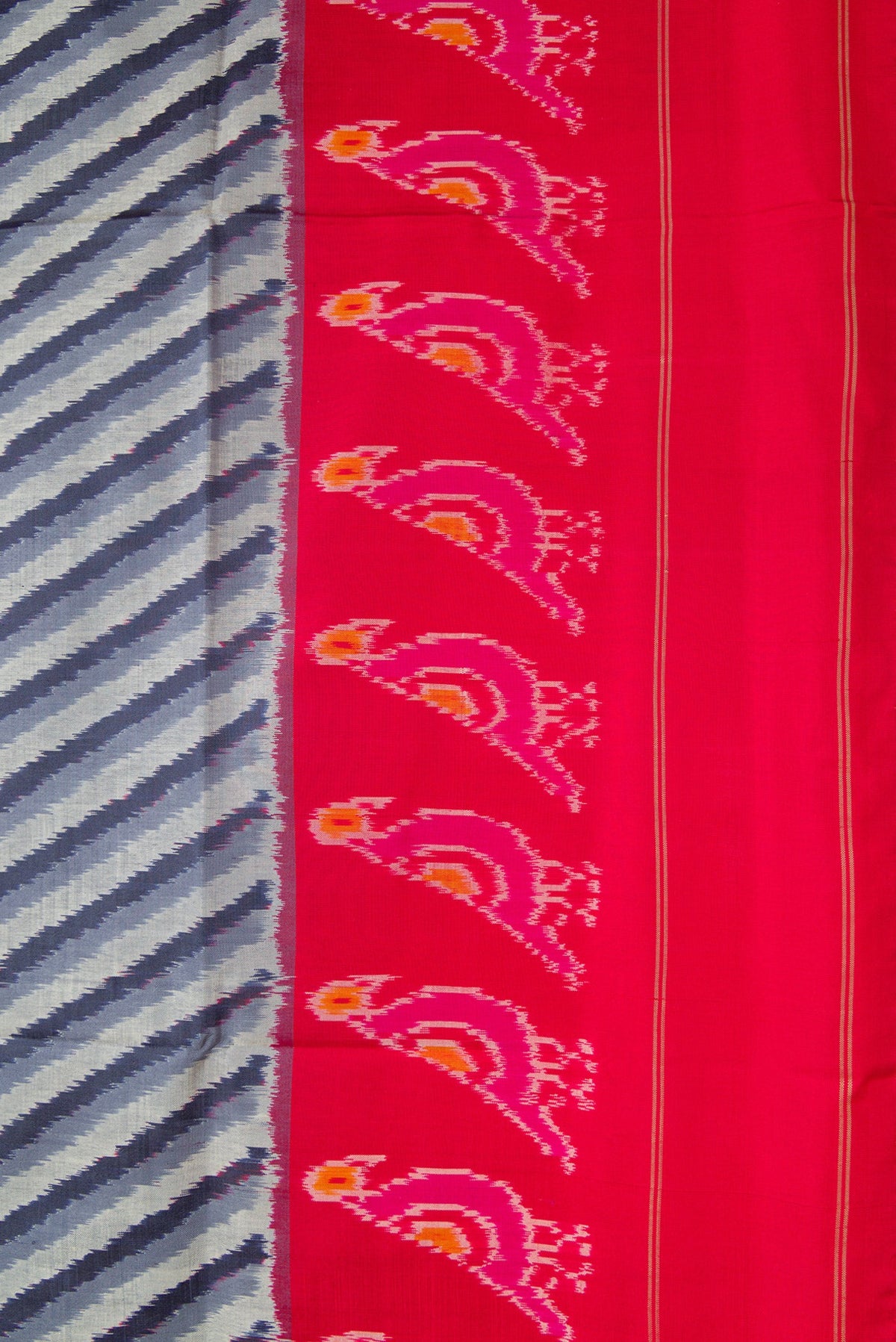Border image of Grey Dual Tone Double Ikat Saree with Ikat Print on the body and Ikat Border. 