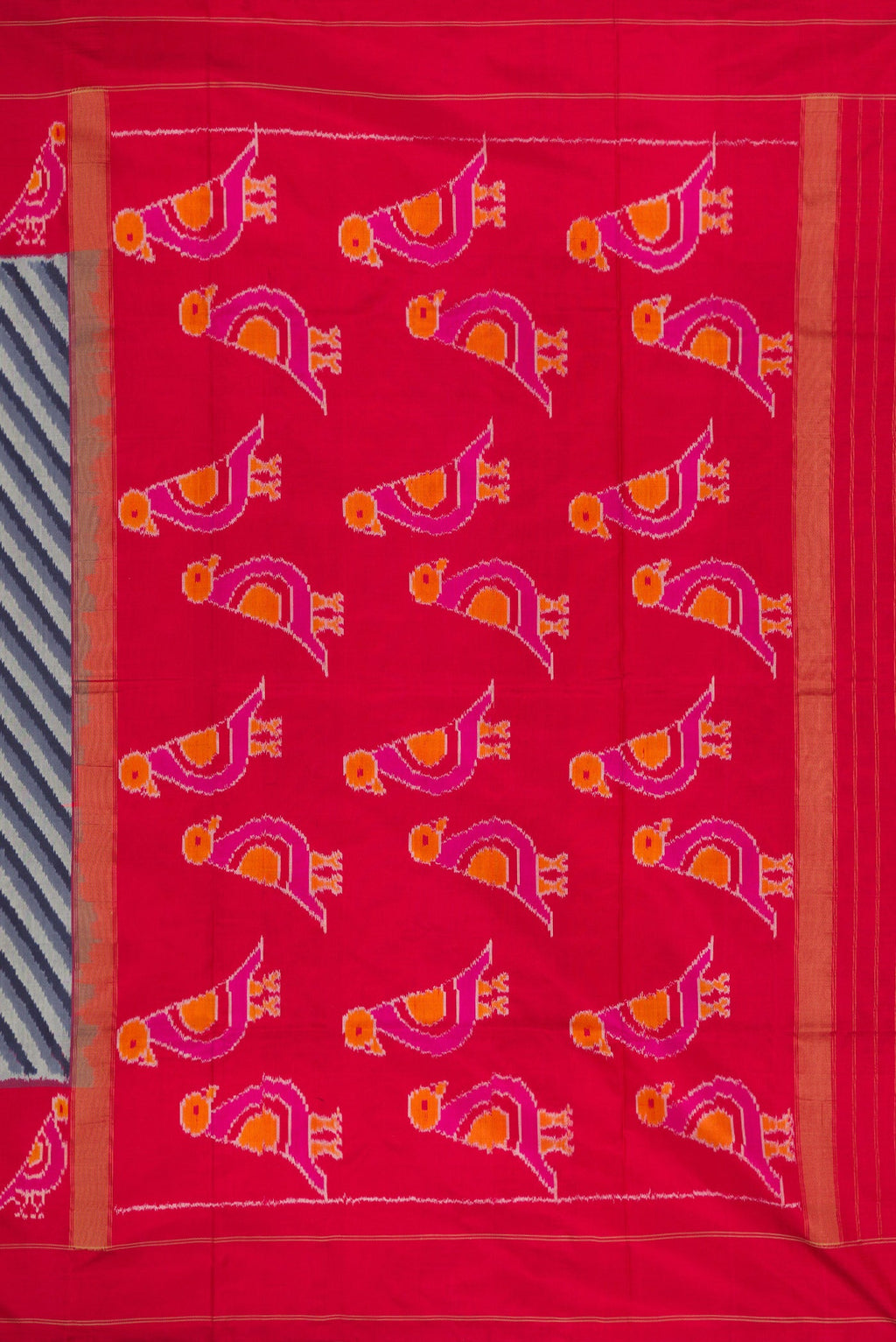 Close up image of the pallu of Grey Dual Tone Double Ikat Saree with Ikat Print on the body and Ikat Border. 