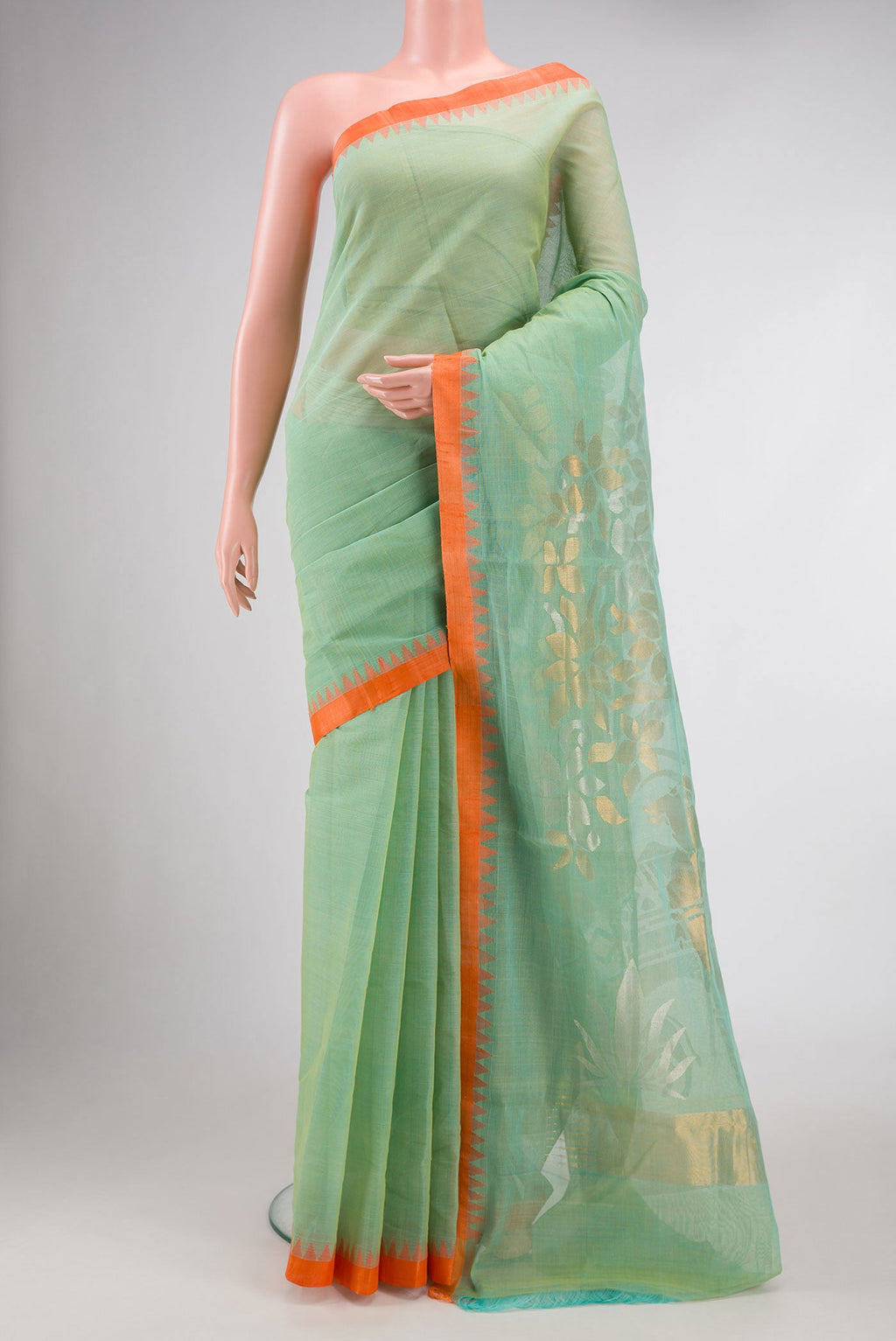 Pista Green Dual Tone Uppada Silk Saree with Plain Body and Thread Border.  displayed on a mannequin