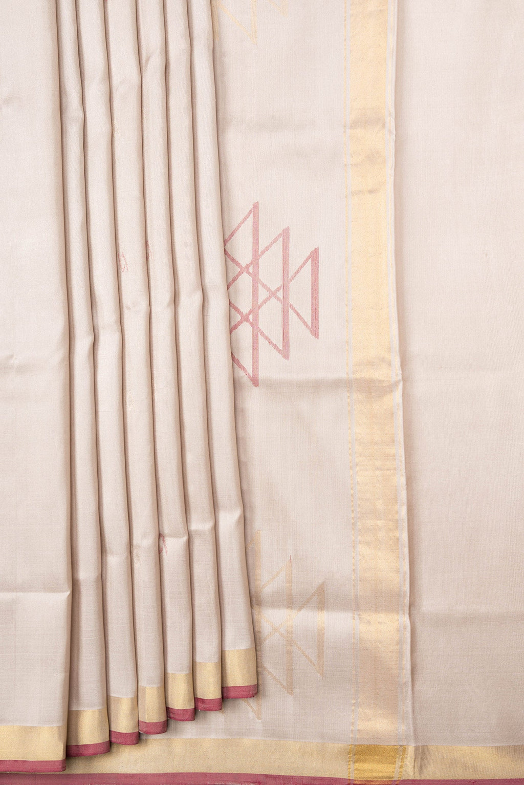 Pleats and pallu of Beige Dual Tone Uppada Silk Saree with Zari And Thread Butta on the body and Zari Border. 