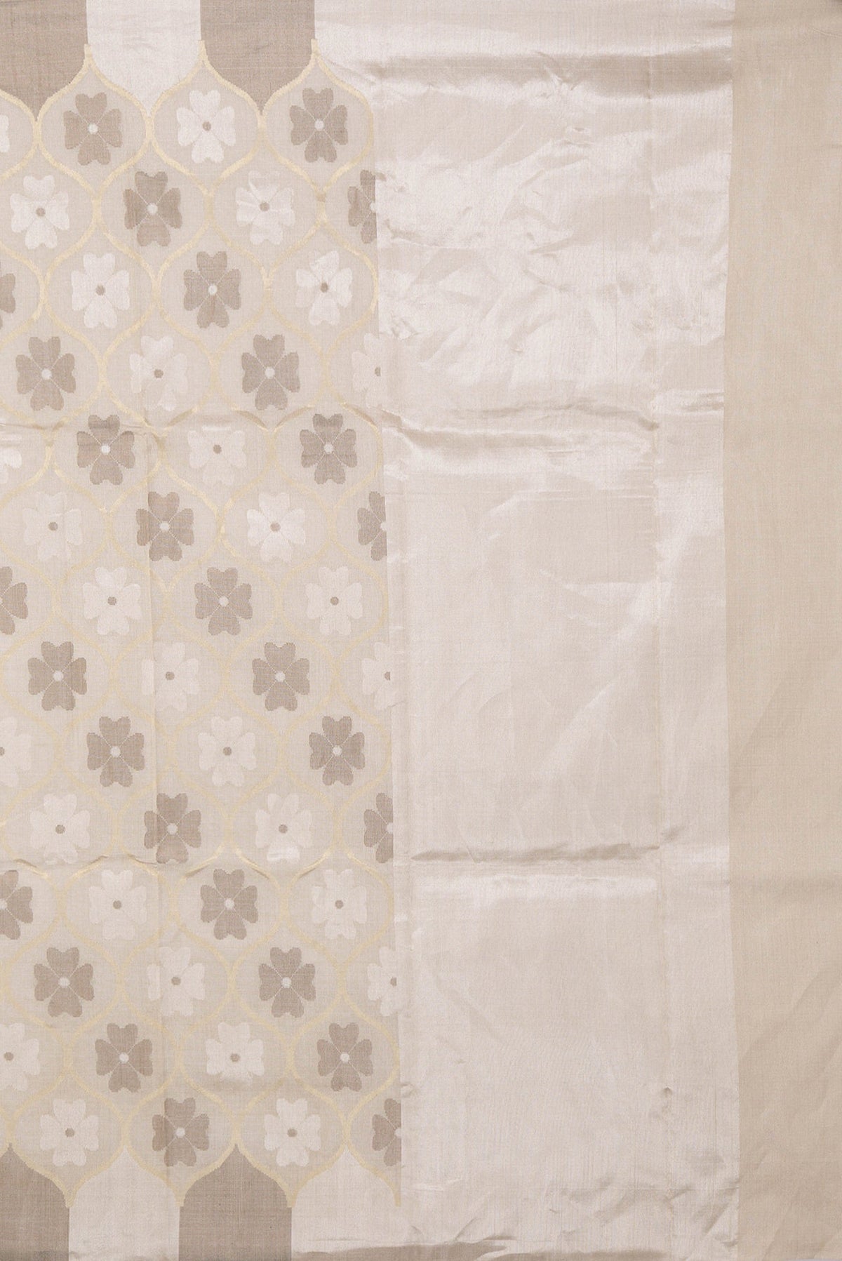 Close up image of the pallu of Beige Dual Tone Chanderi Silk Saree with Zari Brocade on the body and Without Border. 